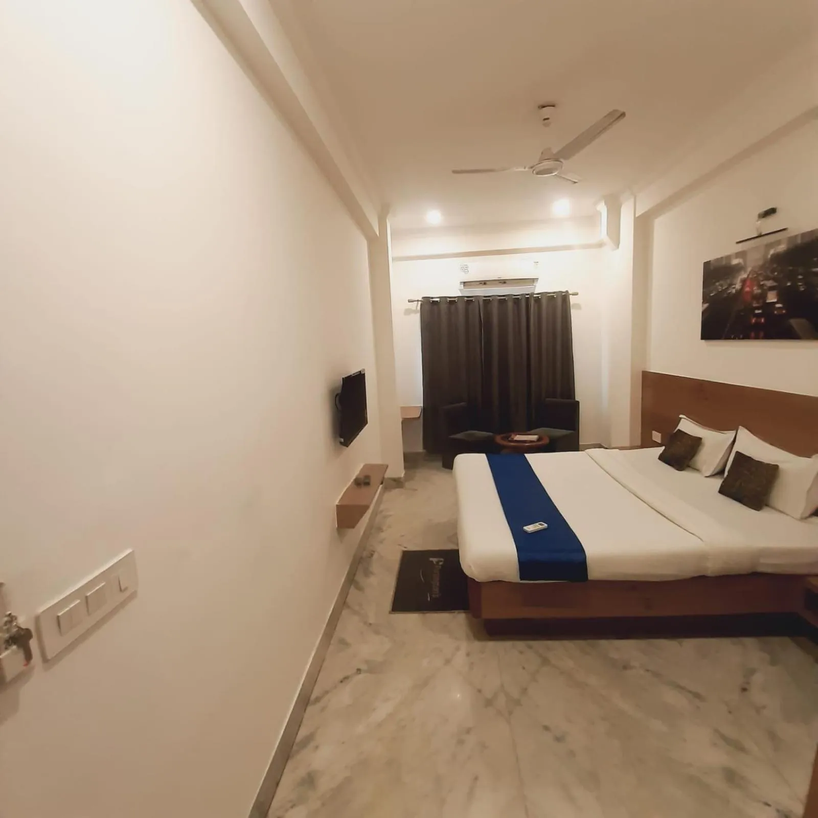 Photo of the whole room, Bed in Hotel Nisha Nest, Bhopal