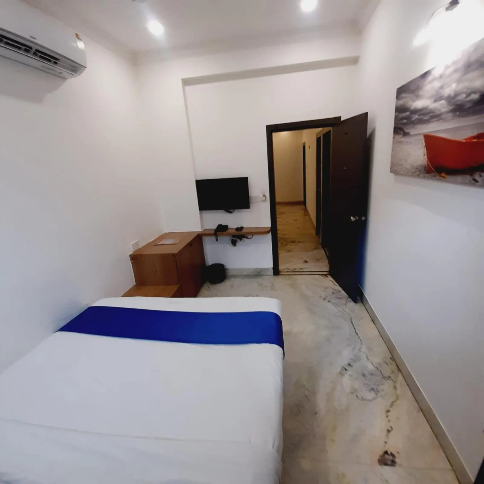 Photo of the whole room, Bed in Hotel Nisha Nest, Bhopal