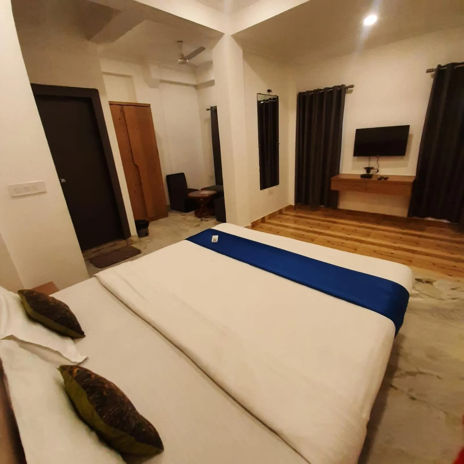 Photo of the whole room, Bed in Hotel Nisha Nest, Bhopal