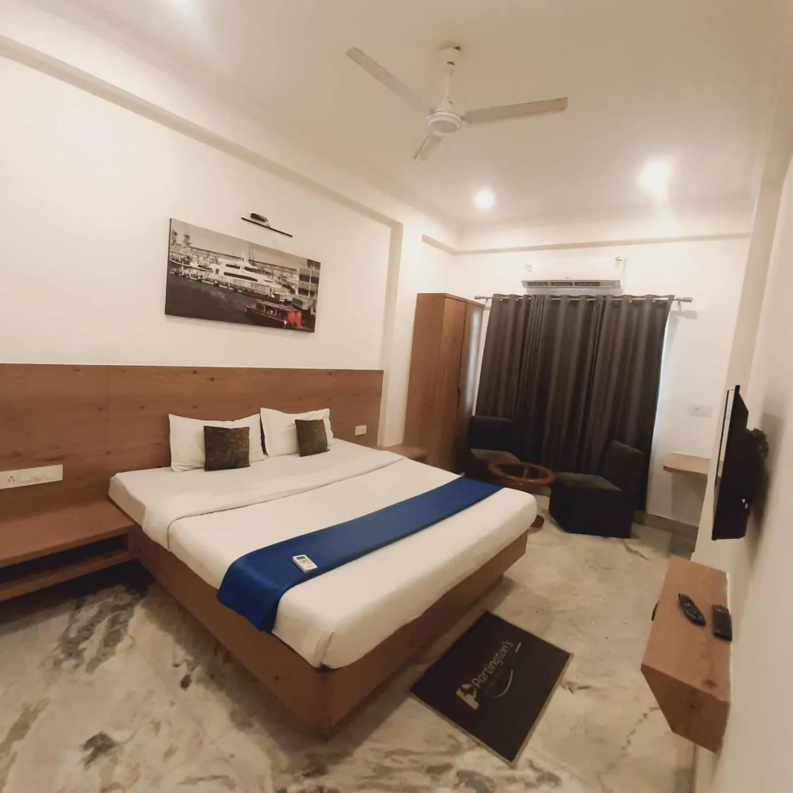 Photo of the whole room, Bed in Hotel Nisha Nest, Bhopal