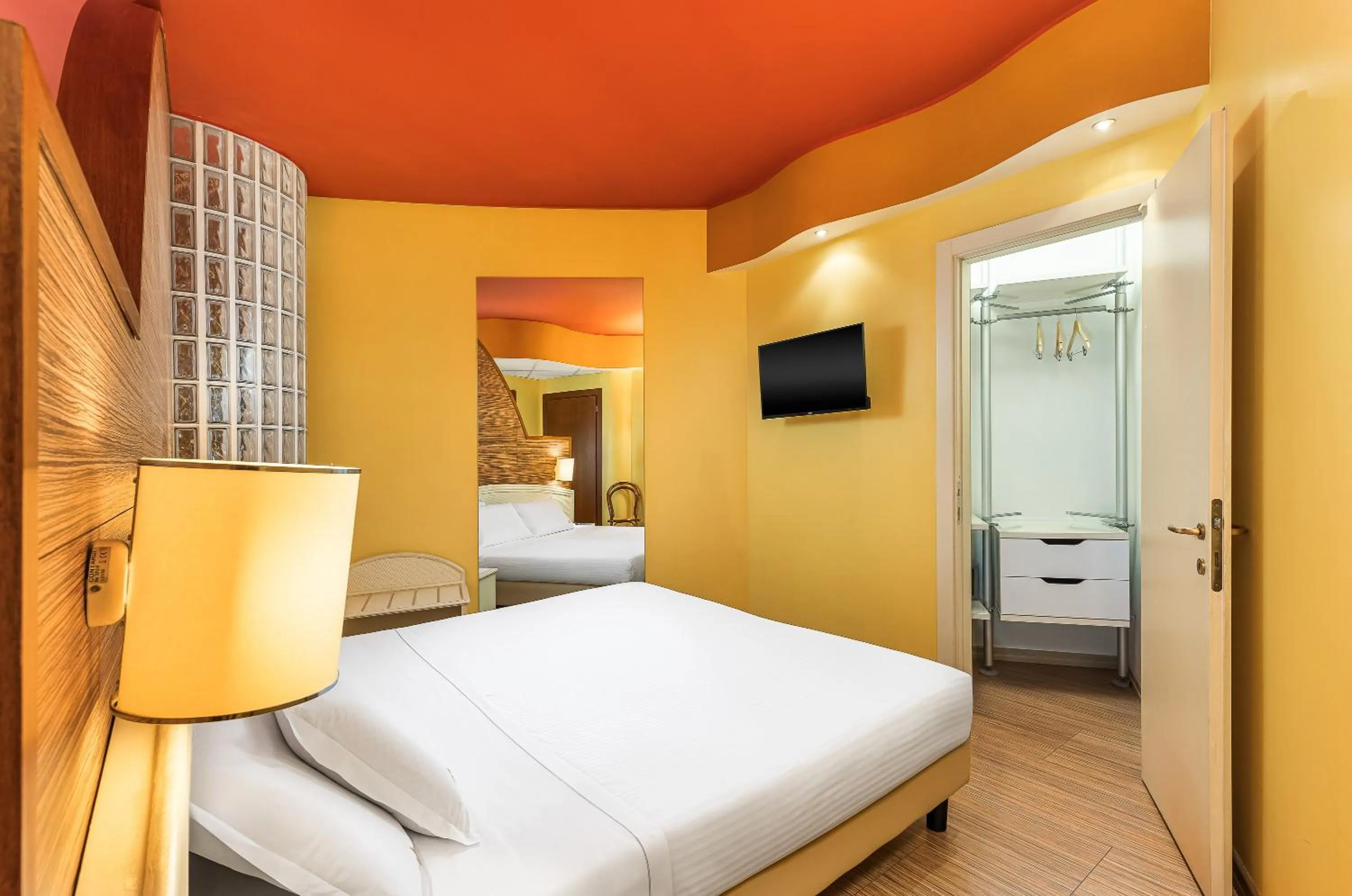 Bed in Welcome Hotel