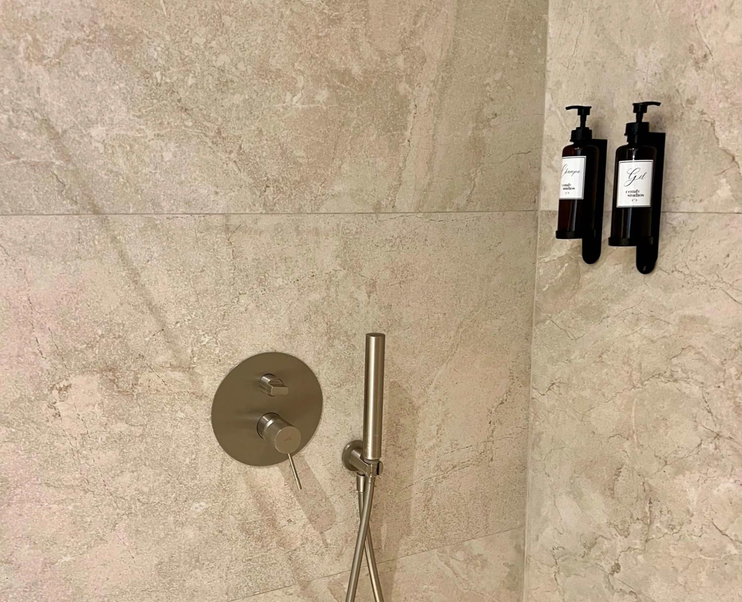 Shower in Comfy Studios Hotel