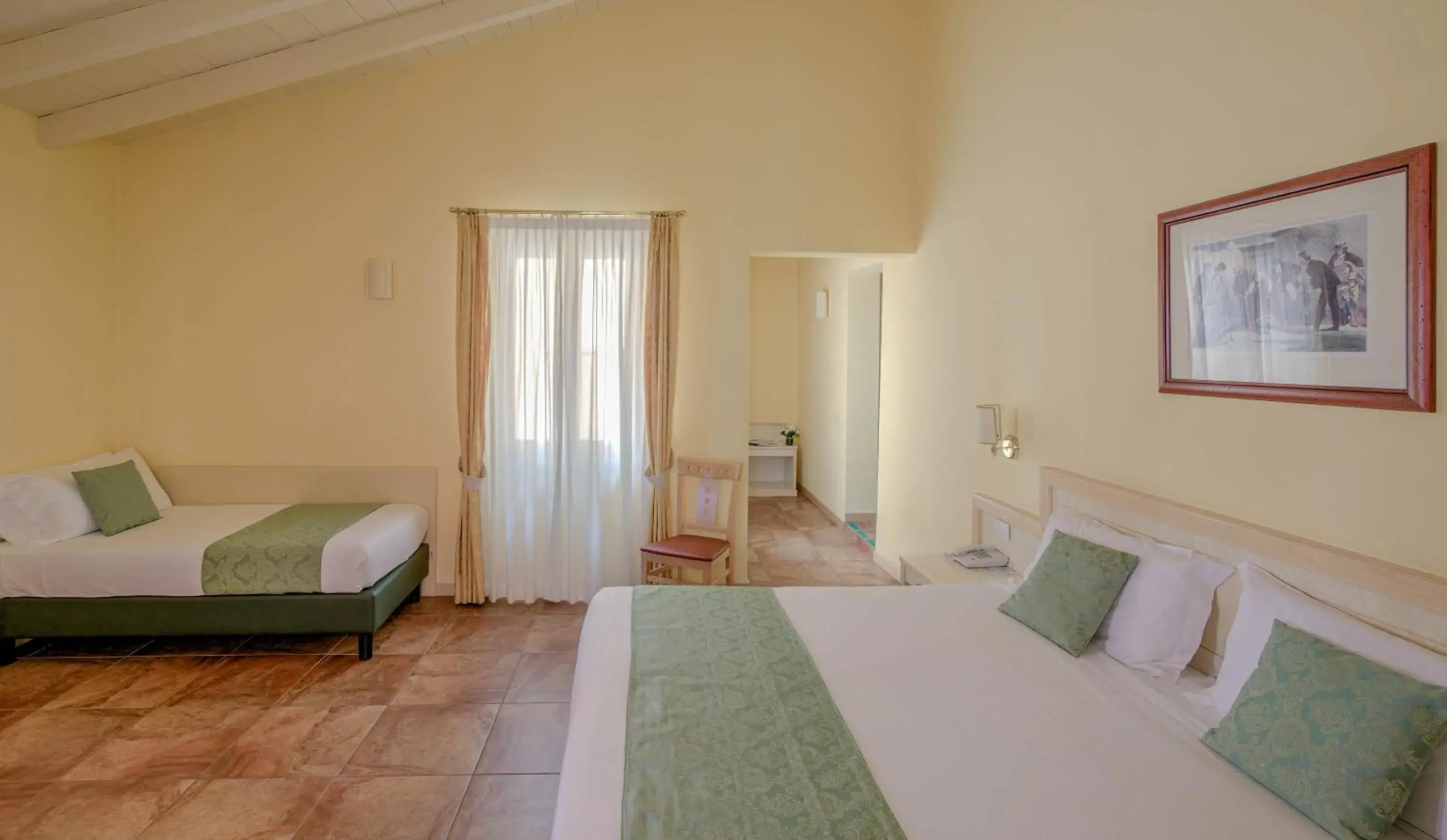 Attic Triple Room in Hotel Belvedere San Gottardo by LVG Hotel Collection Attic Triple Room in Hotel Belvedere San Gottardo by LVG Hotel Collection