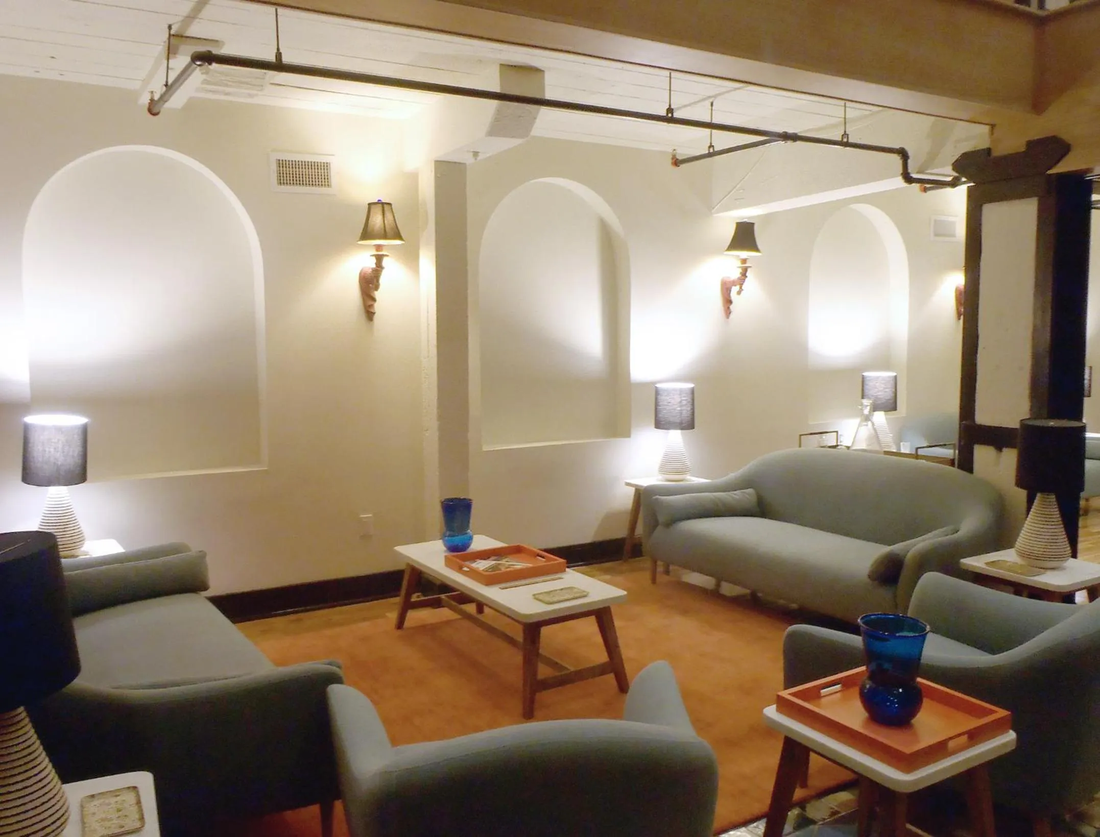 Communal lounge/ TV room in Henry Norman Hotel