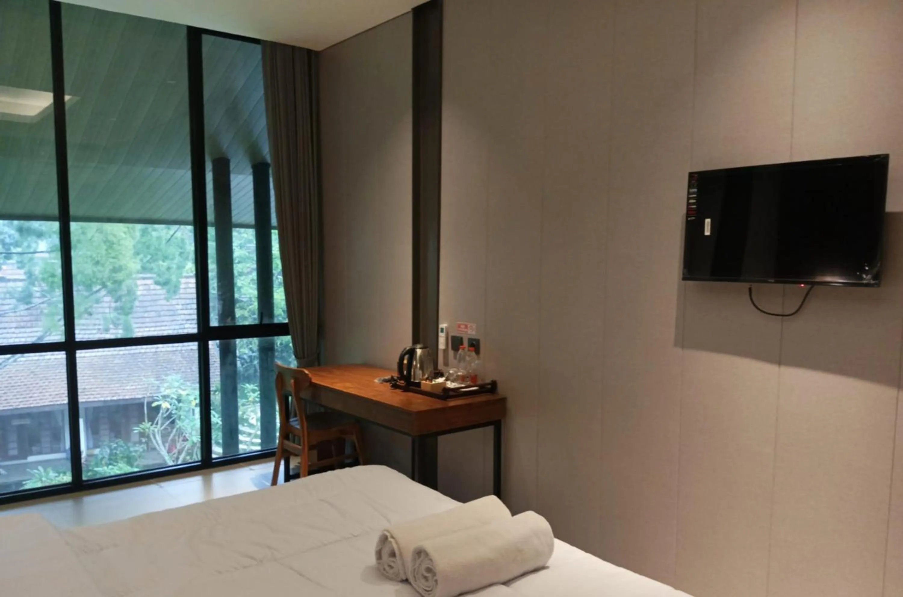 Bed in The Village Resort Bogor Powered by Archipelago