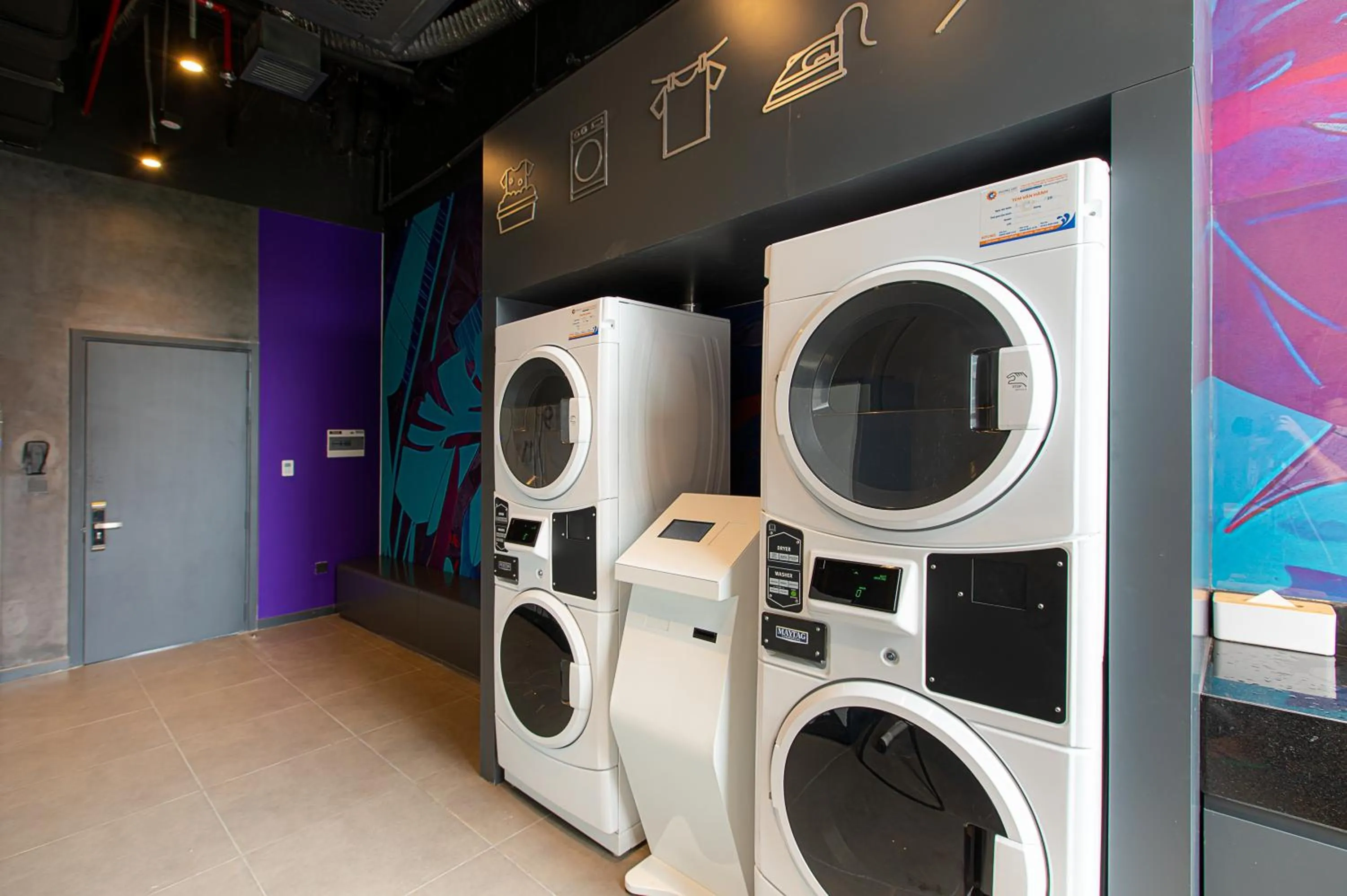 washing machine in SOJO Hotel Hau Giang