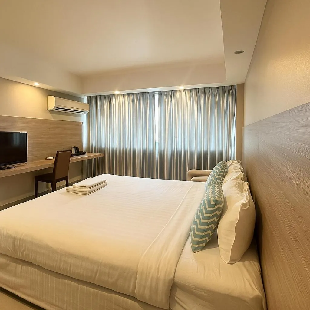 Bed in Avana Laem Chabang Boutique Hotel