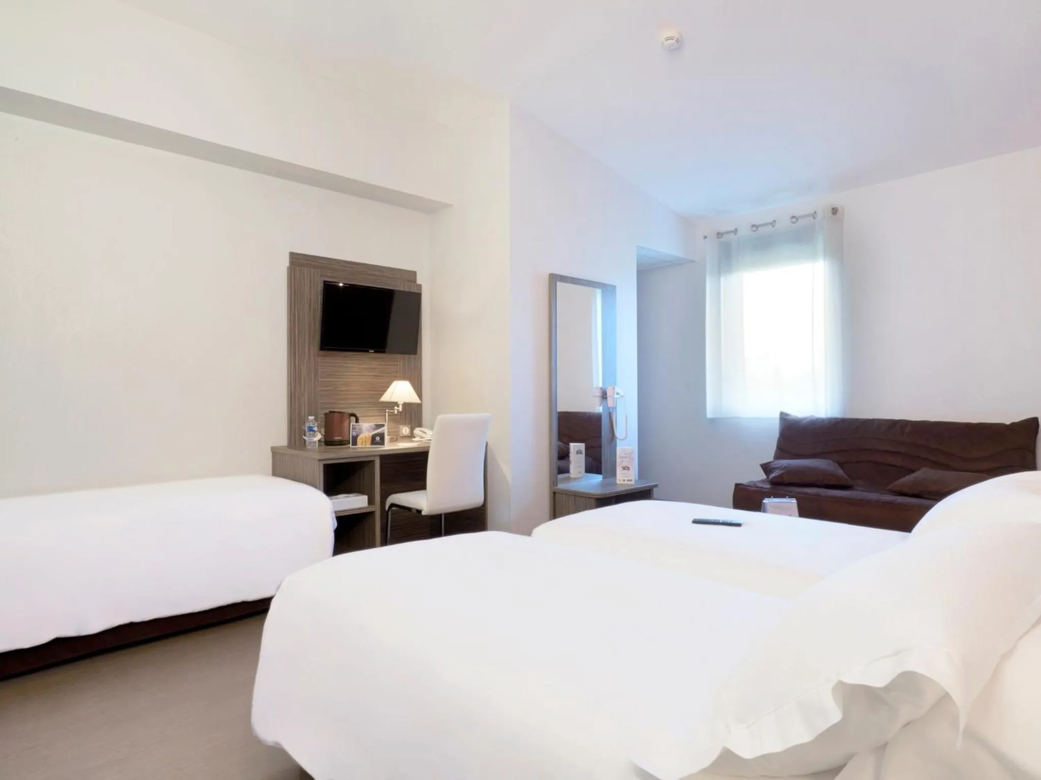 TV and multimedia, Bed in Kyriad Saint Chély d'Apcher - Aire de la Lozère