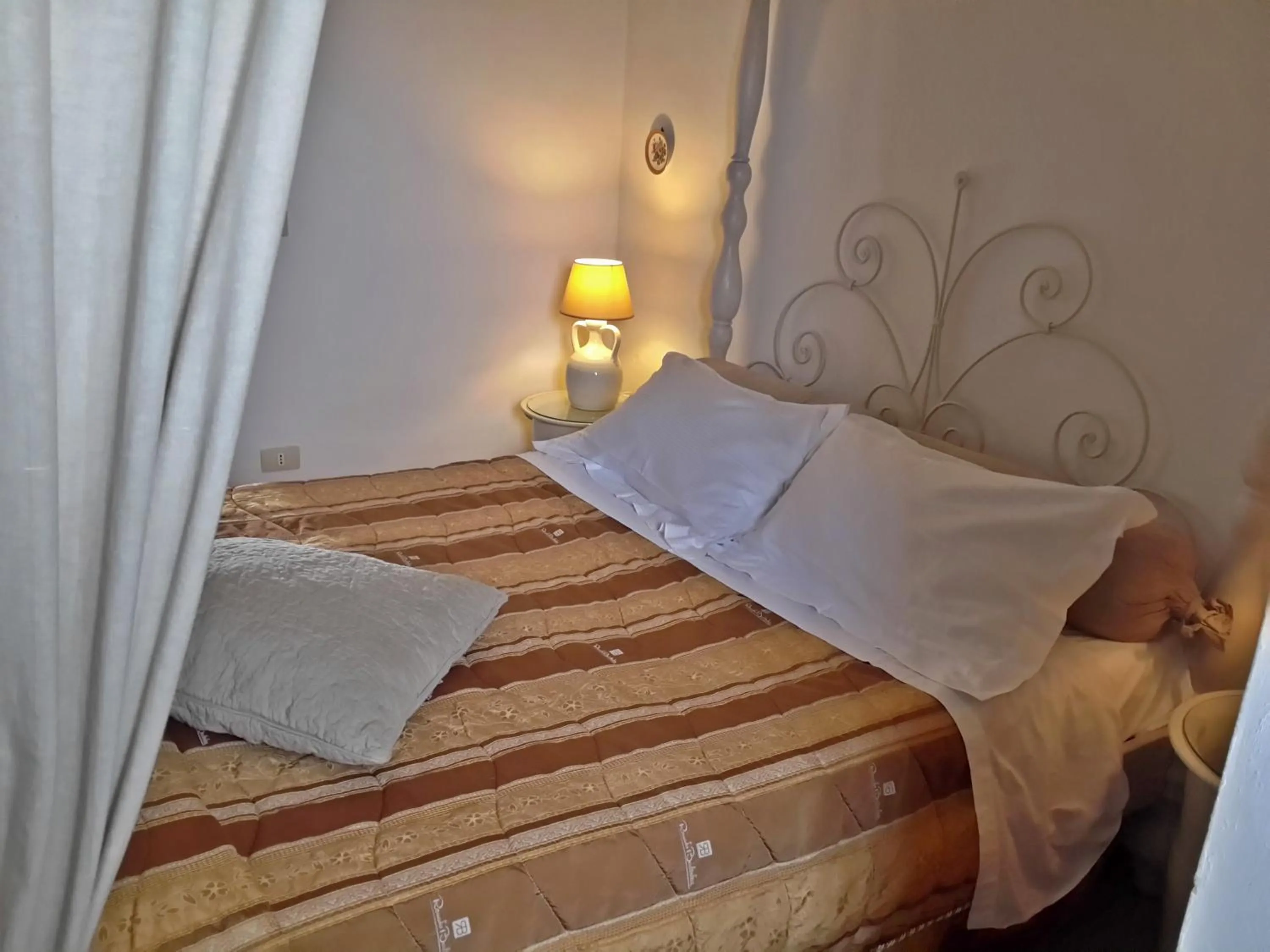 Bed in Masseria Rosa Trulli Relais