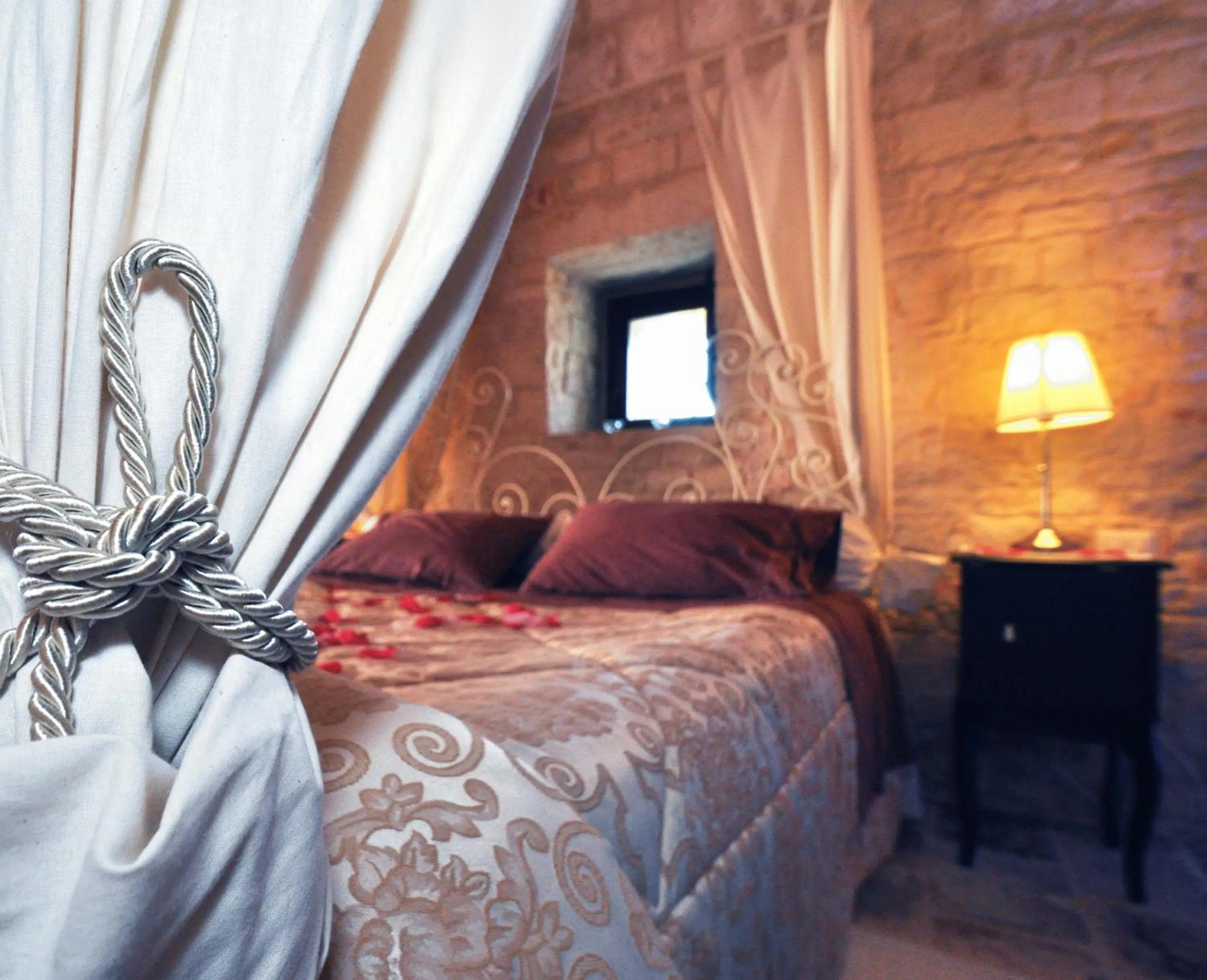 Bed in Masseria Rosa Trulli Relais