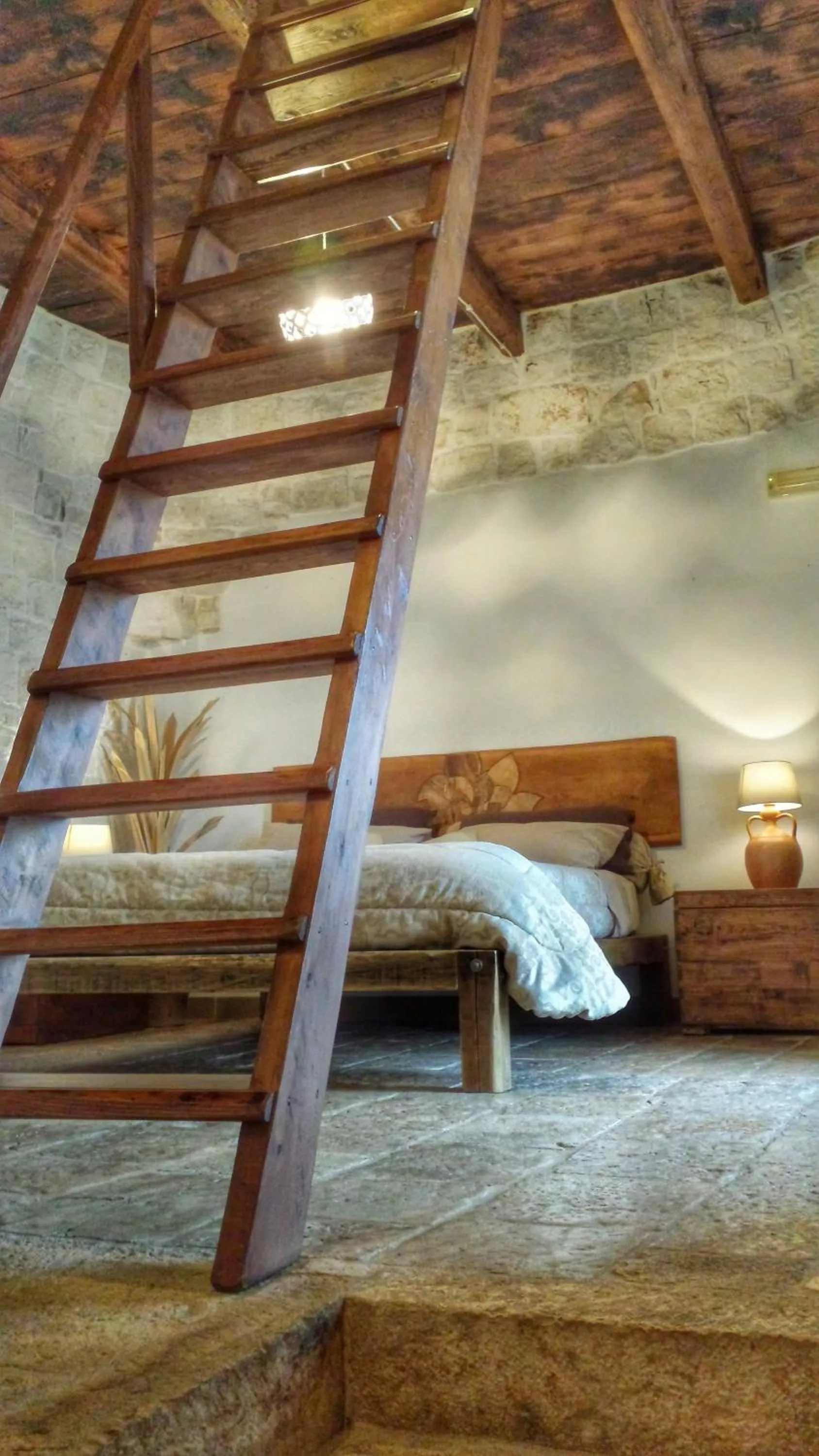 Bed in Masseria Rosa Trulli Relais