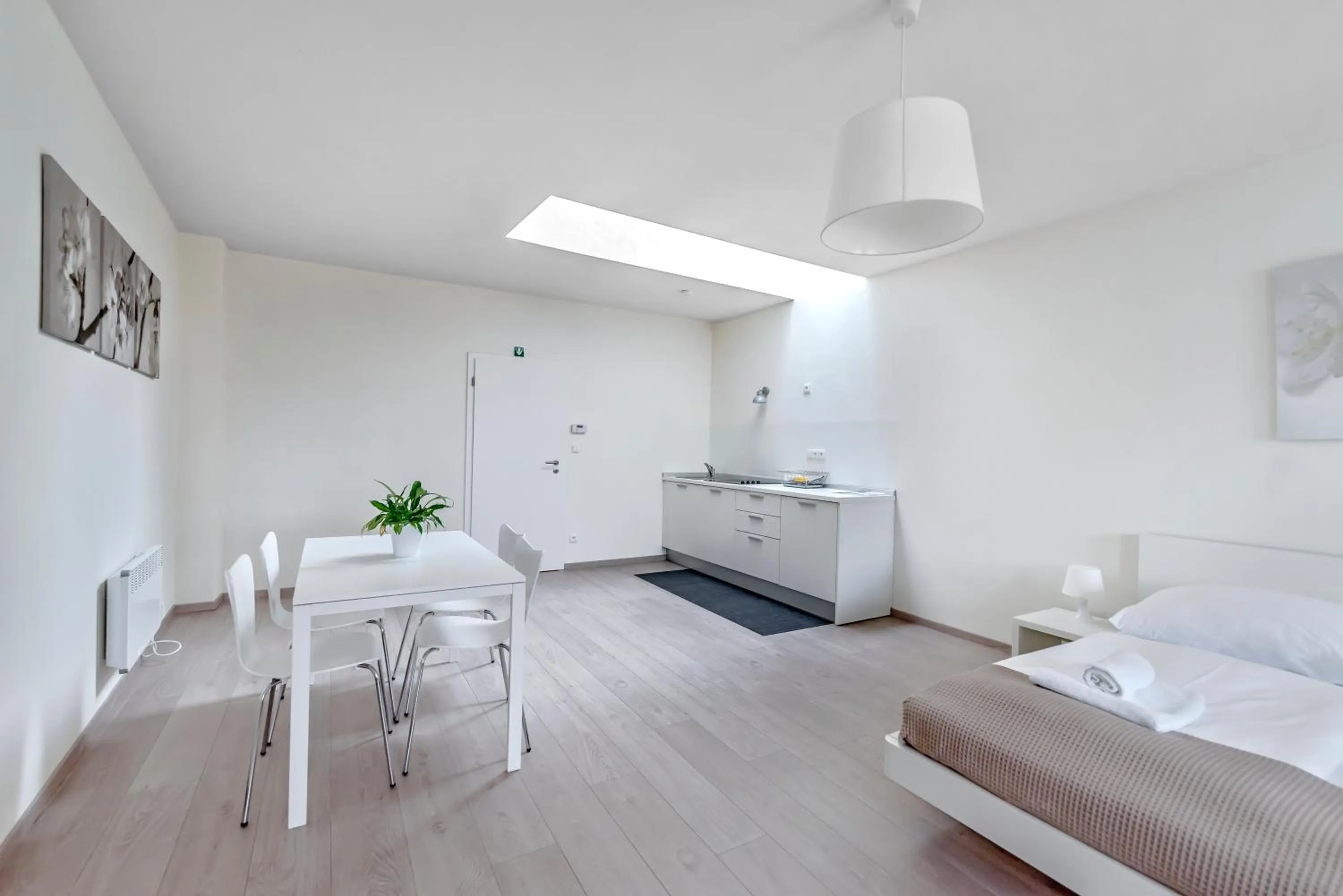 Kitchen or kitchenette, Bed in TGM Hotel Residence