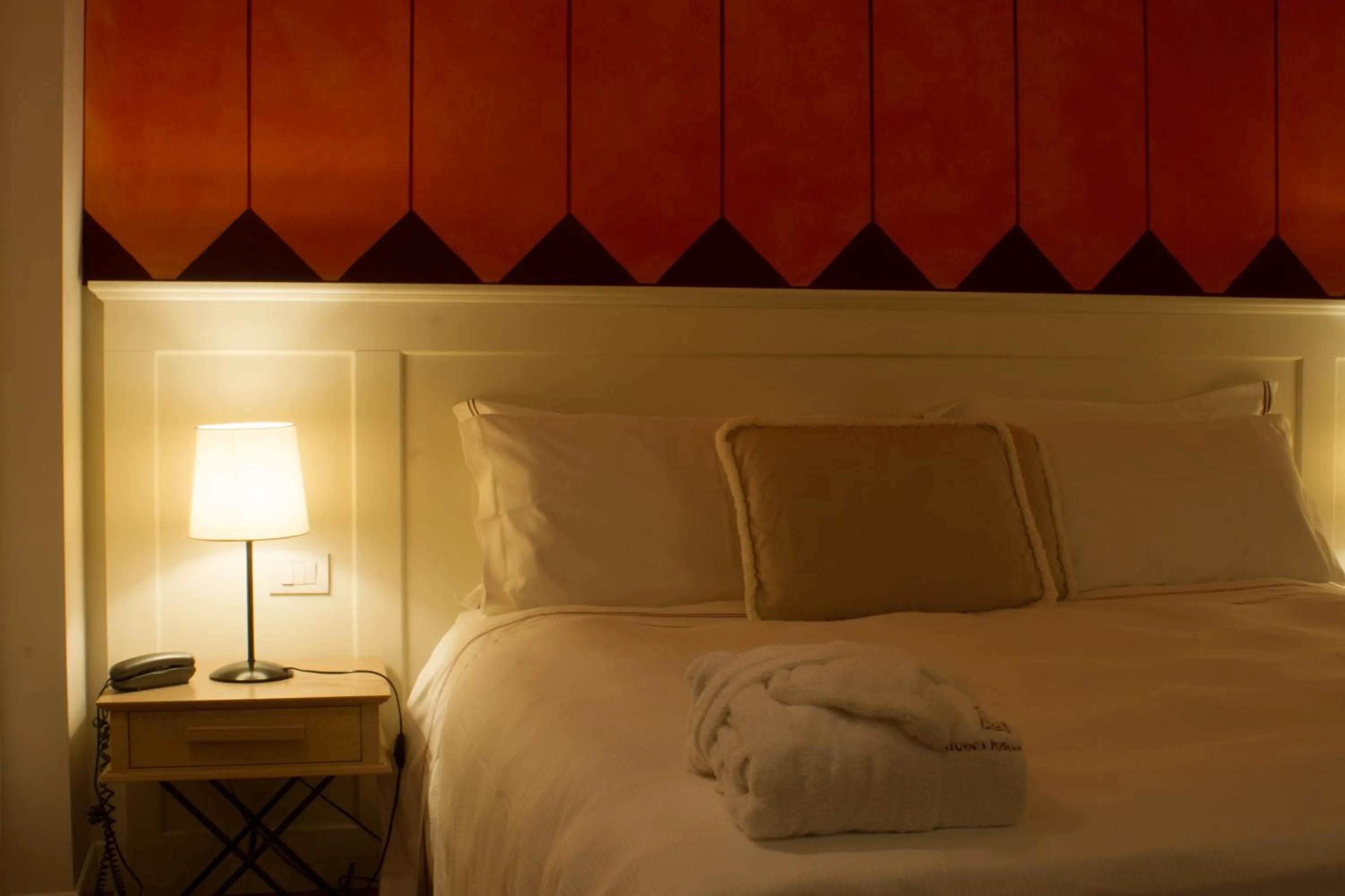 Bed in Saturnia Tuscany Hotel