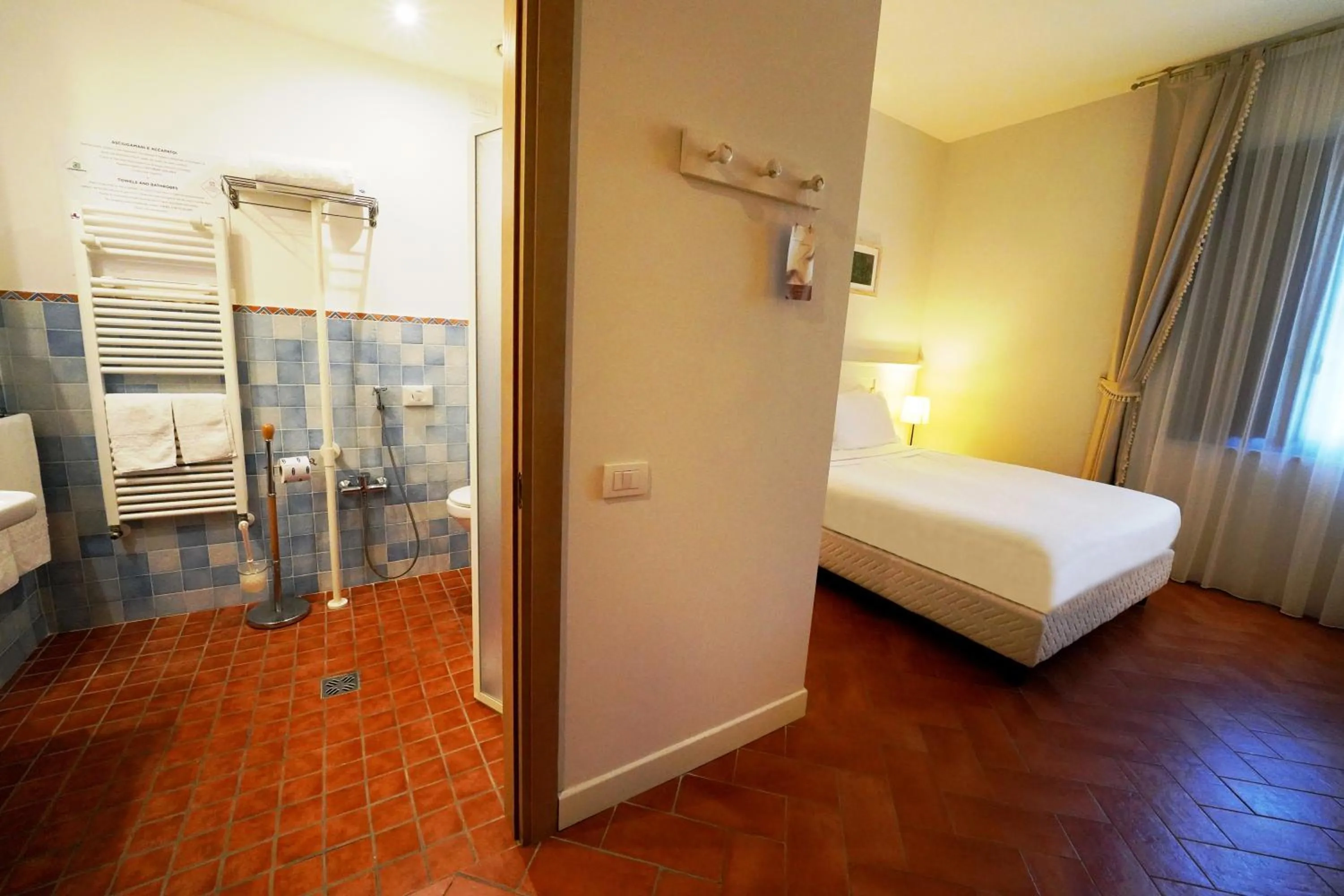 Bed in Saturnia Tuscany Hotel