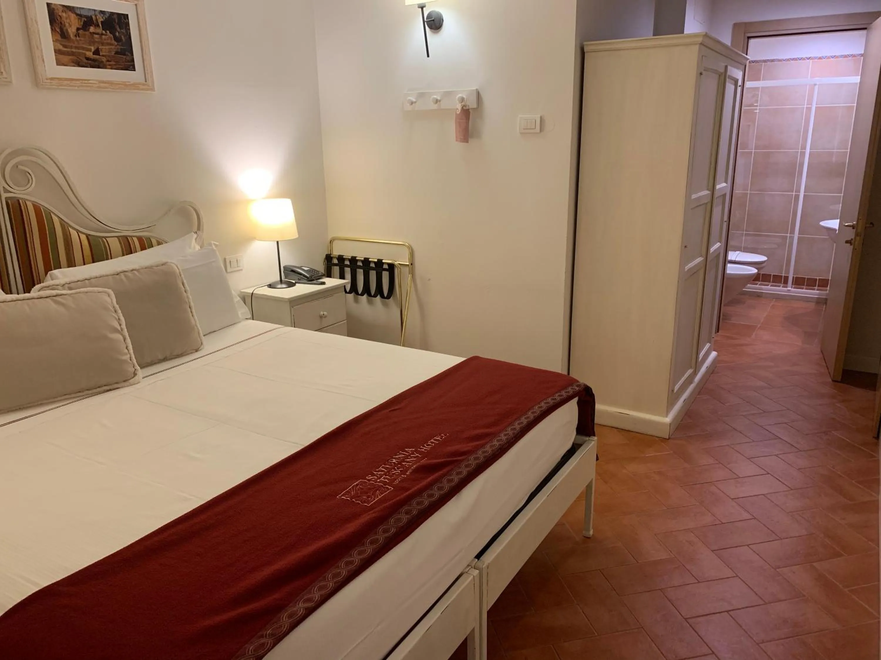 Photo of the whole room, Bed in Saturnia Tuscany Hotel