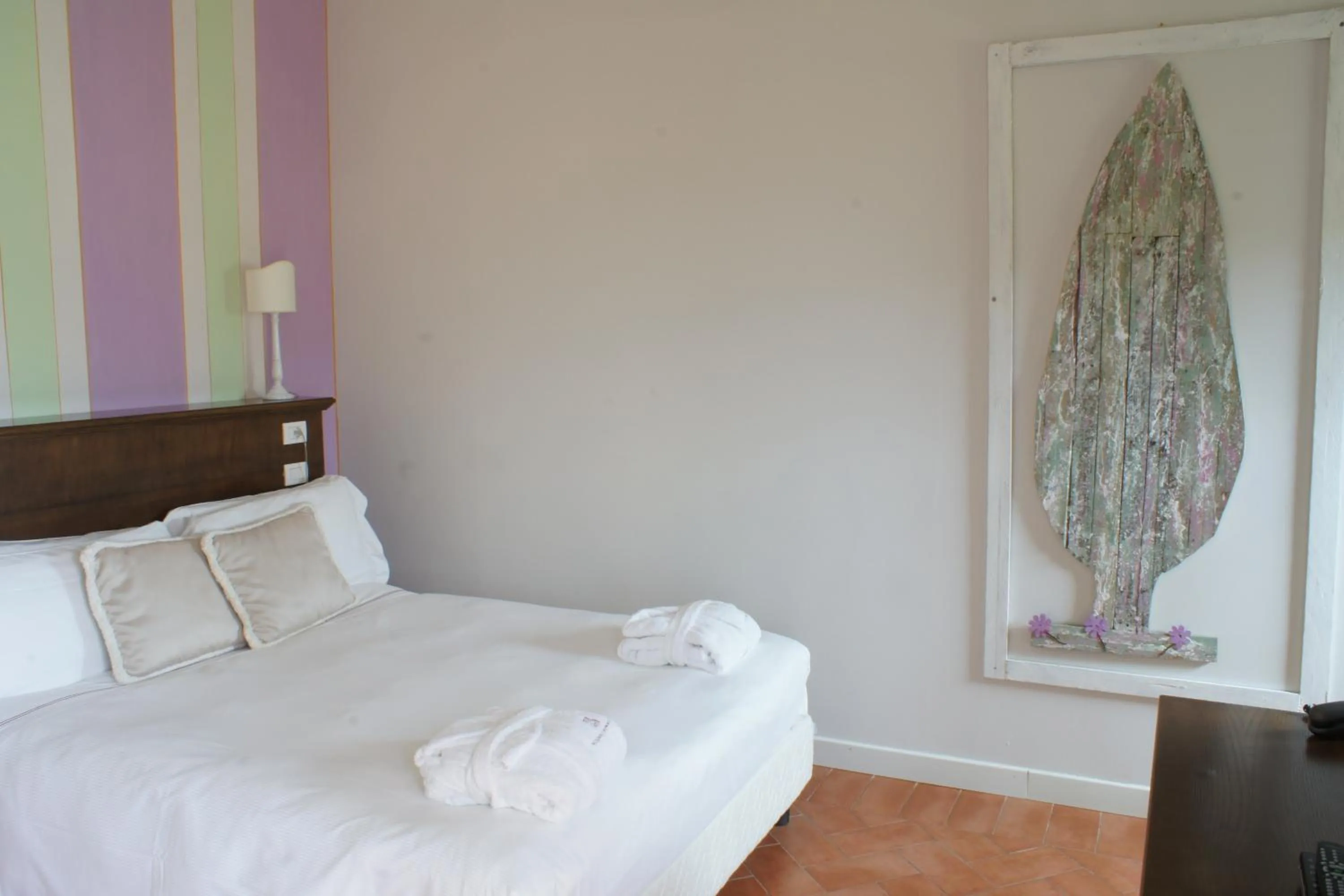 Bed in Saturnia Tuscany Hotel