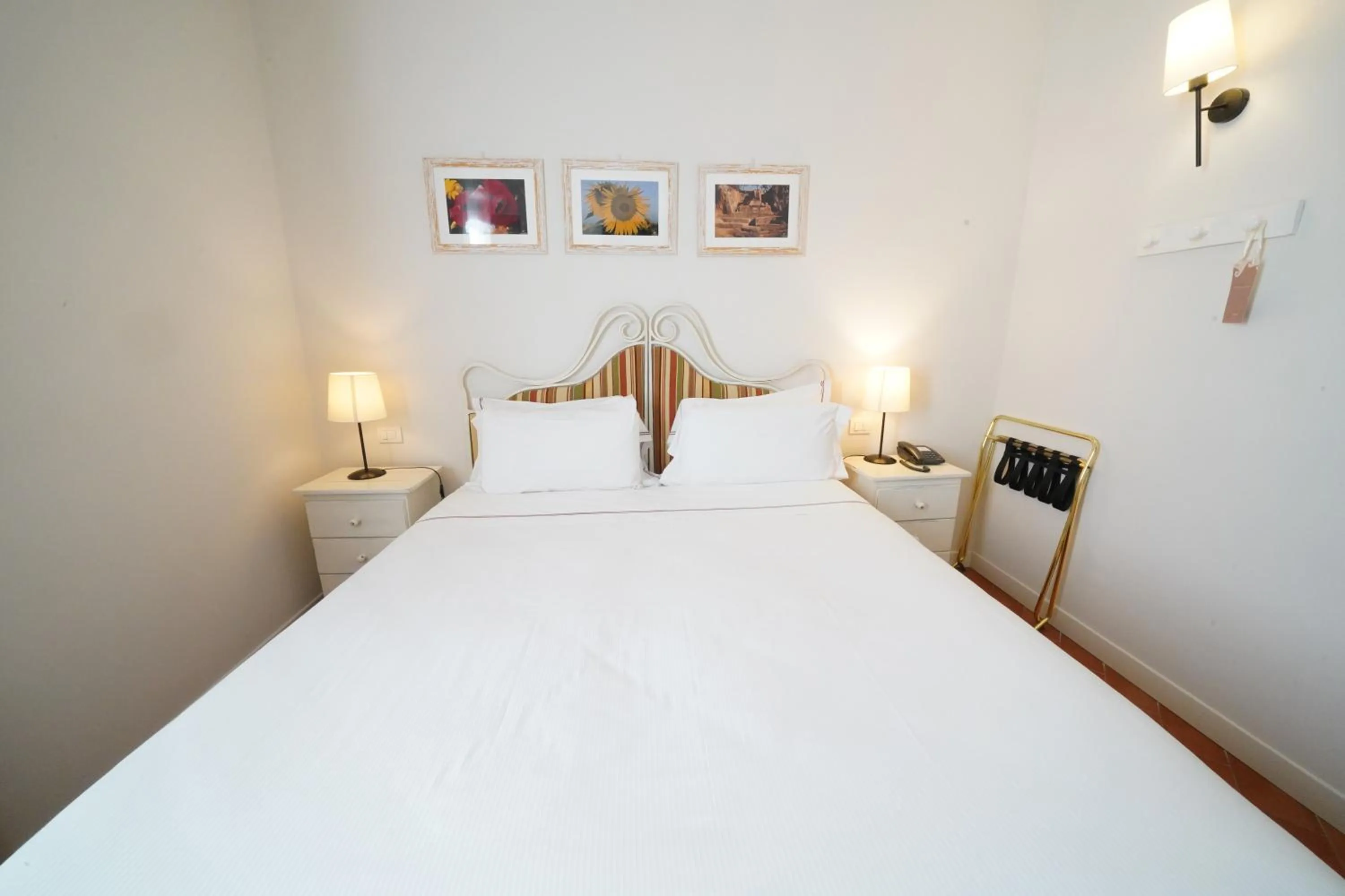 Bed in Saturnia Tuscany Hotel