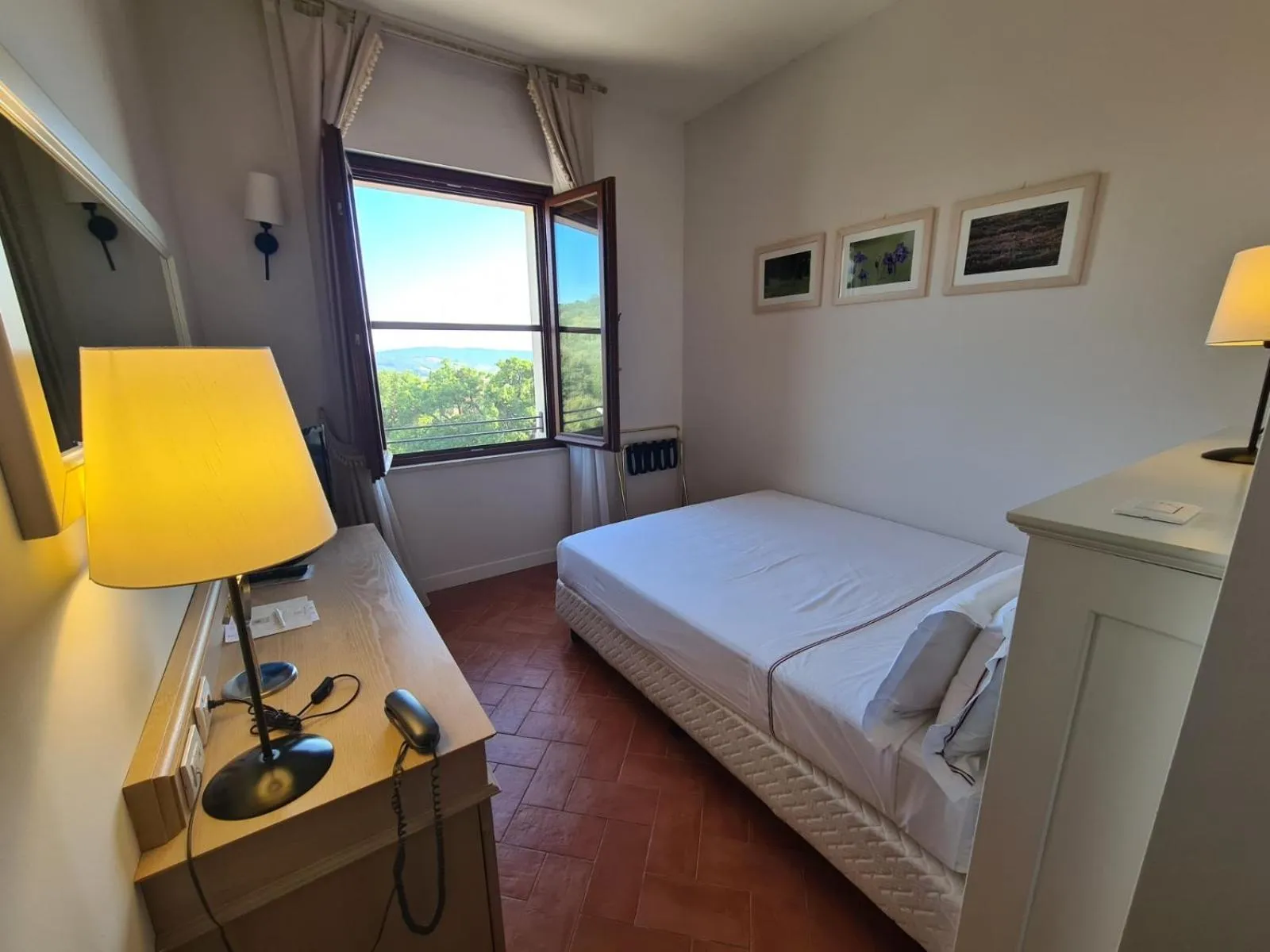 Bed in Saturnia Tuscany Hotel