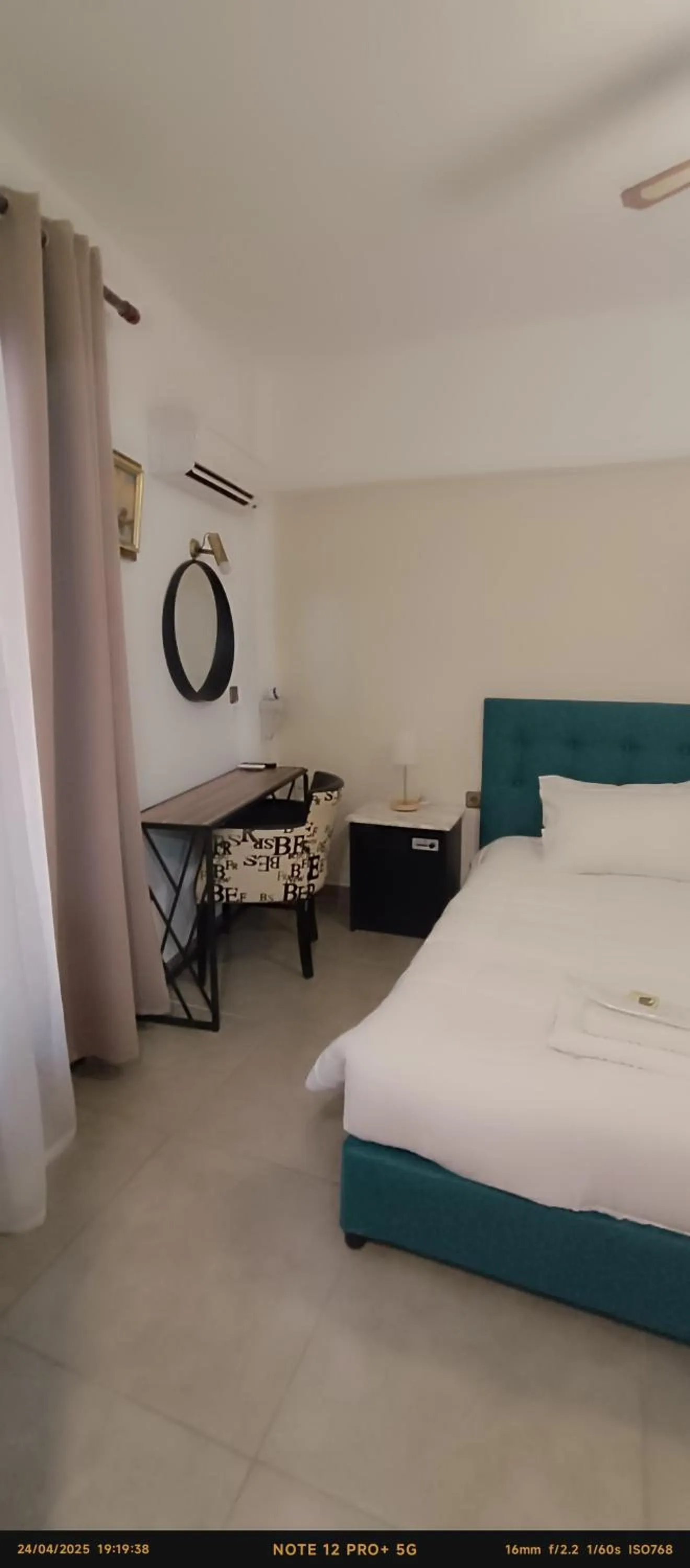 Bed in ODYSSEAS HOTEL SAMOS