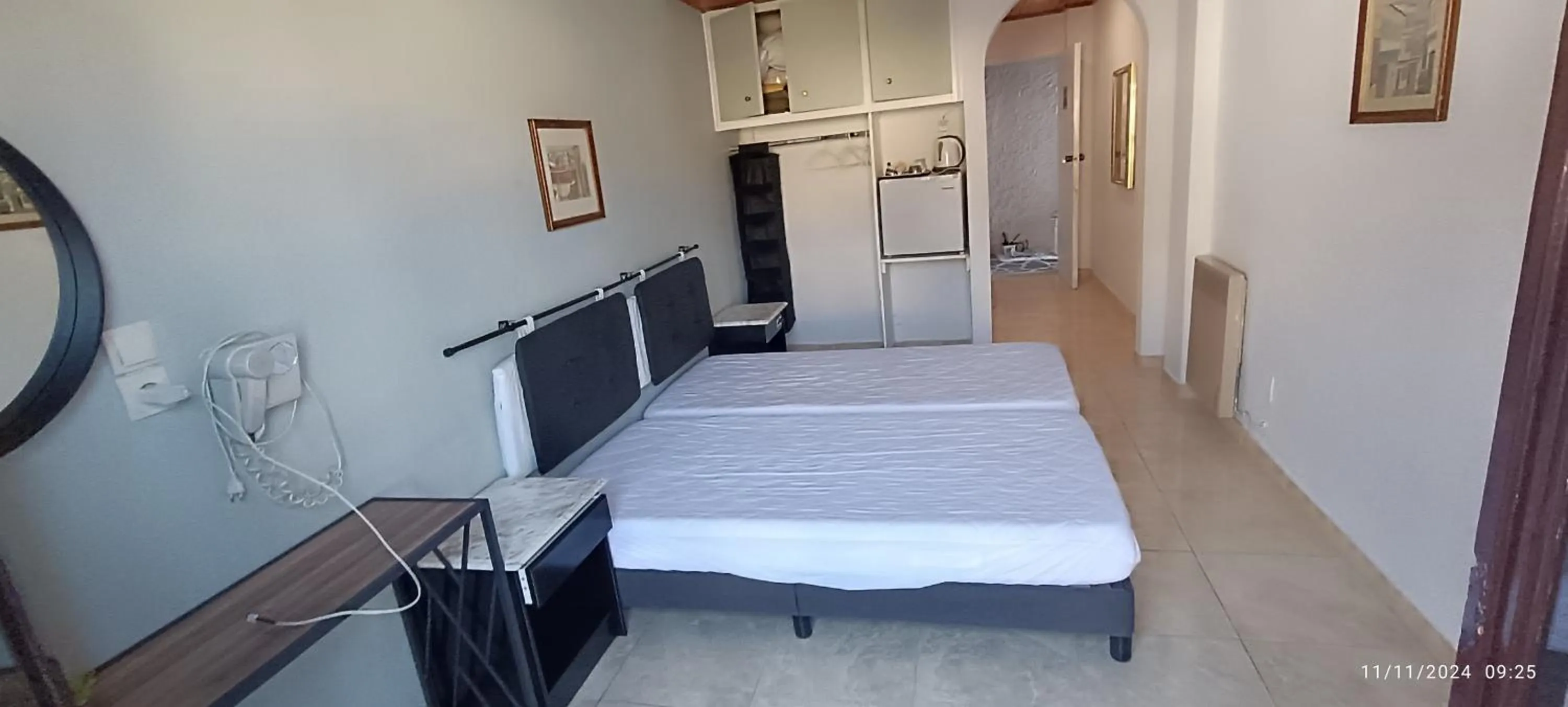 Bed in ODYSSEAS HOTEL SAMOS