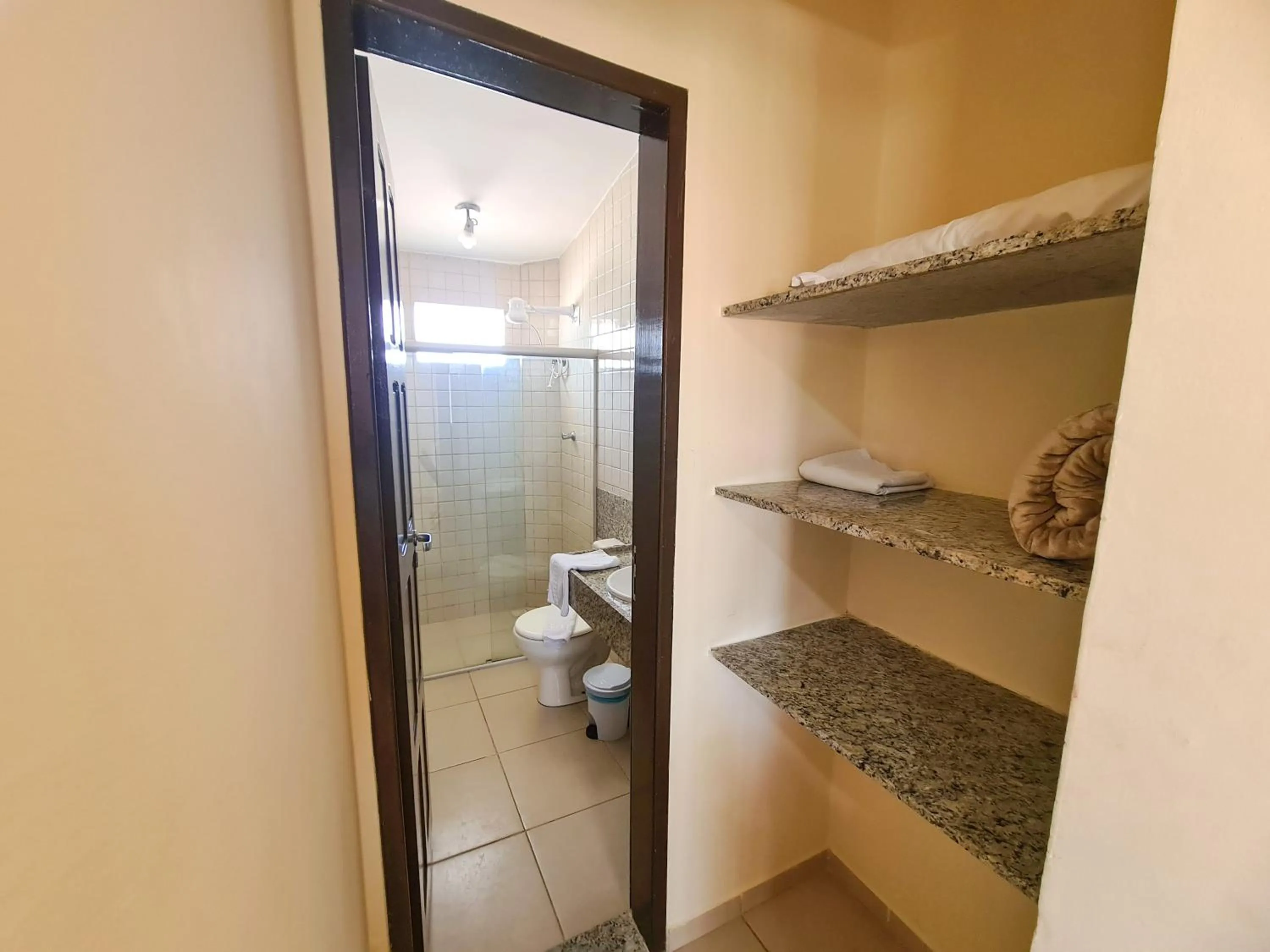 Toilet in Arena Carneiros Hotel by AFT