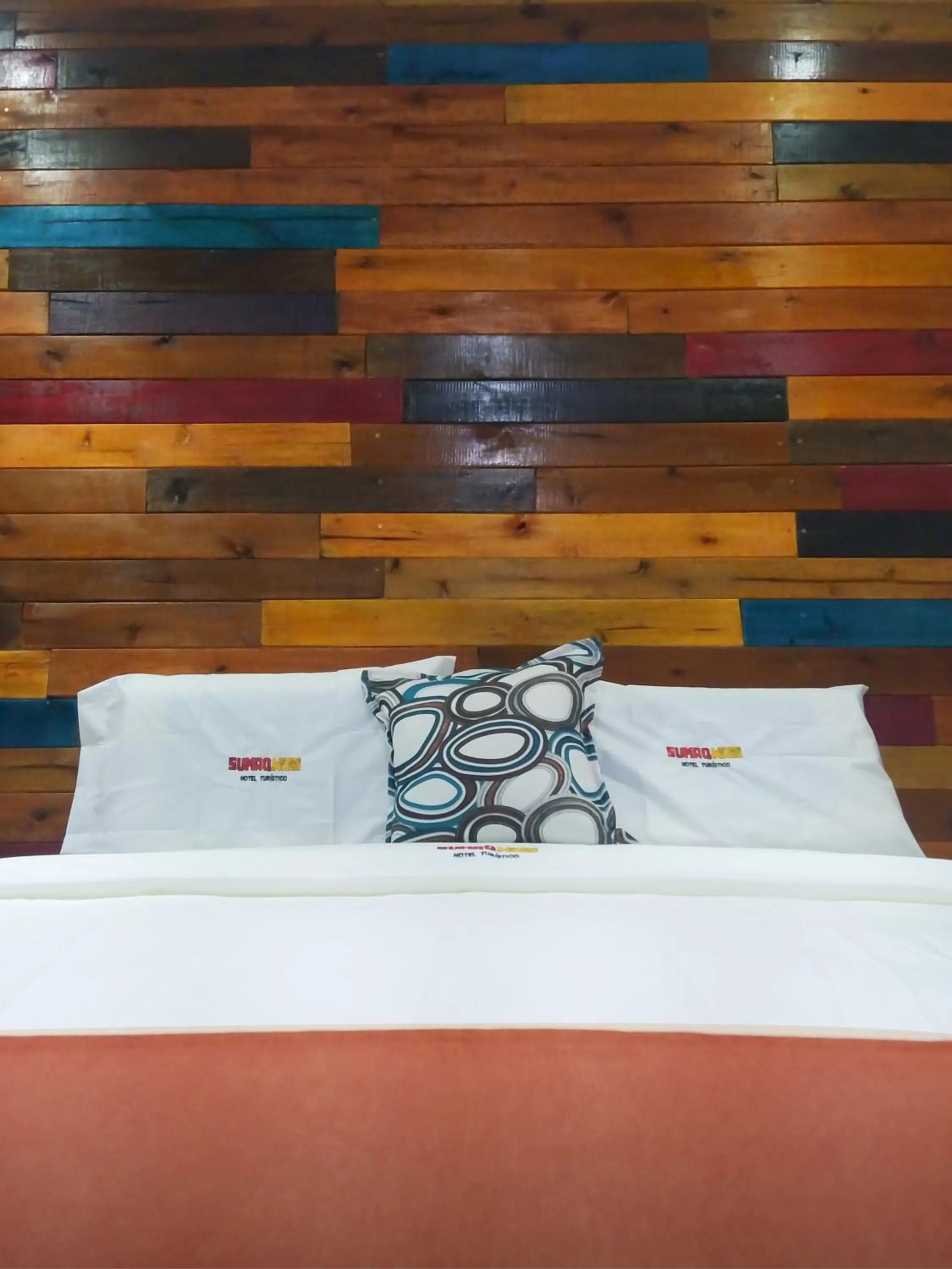 Bed in Sumaq Wari Hotel