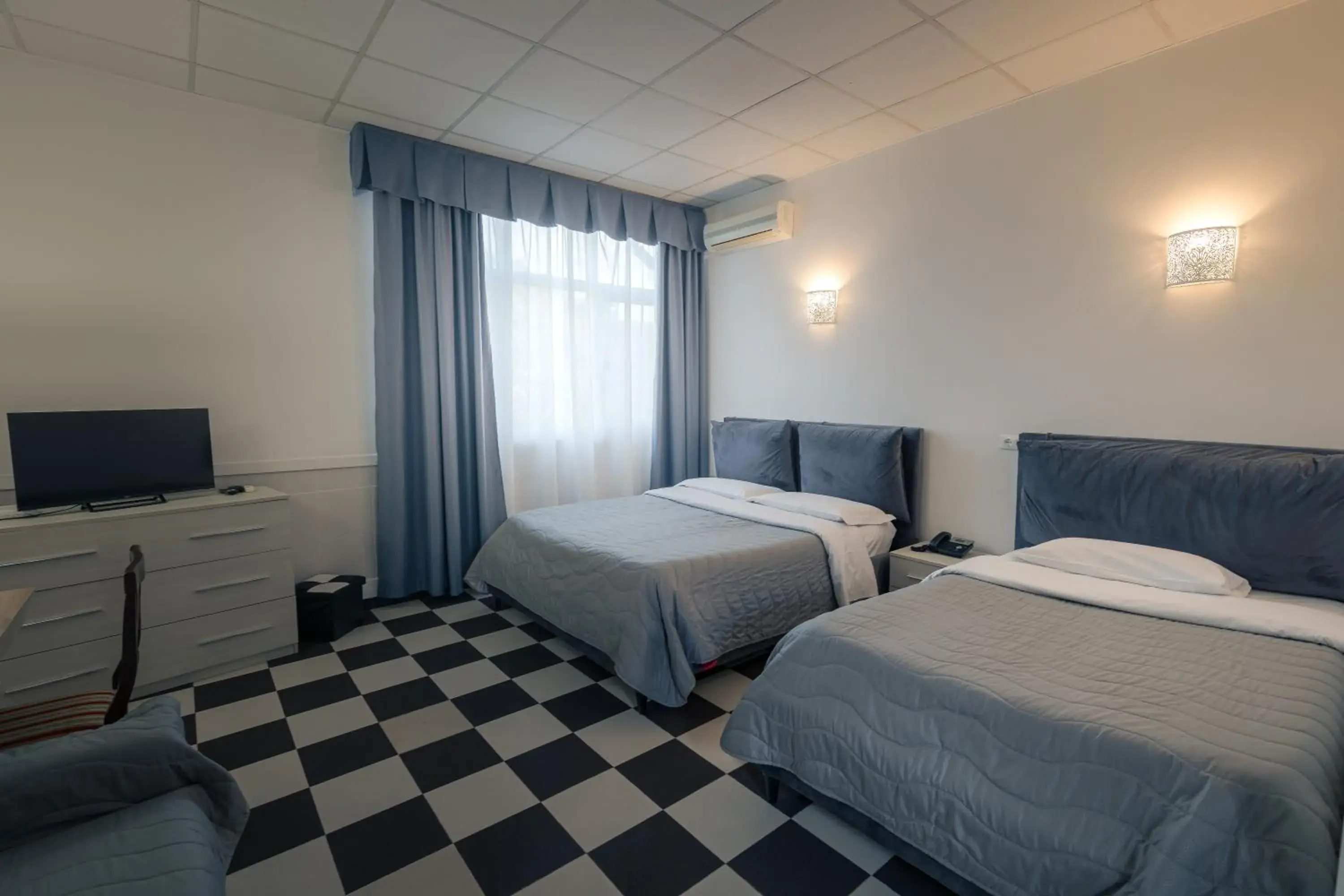 Triple Room in Hotel Giulietta e Romeo Triple Room in Hotel Giulietta e Romeo