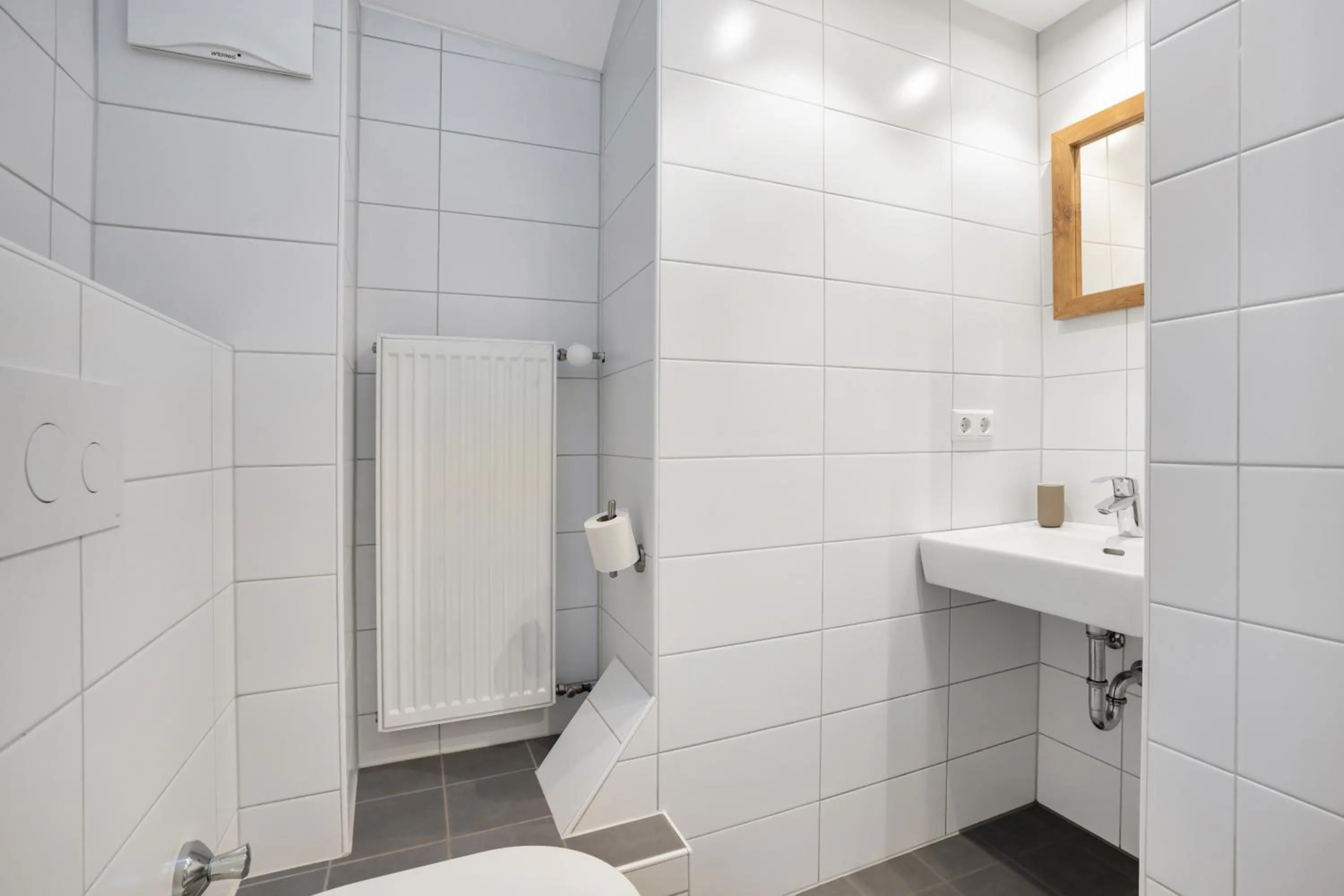 Bathroom in easy-flat Hauptplatz - City Center Apartments with a Kitchen