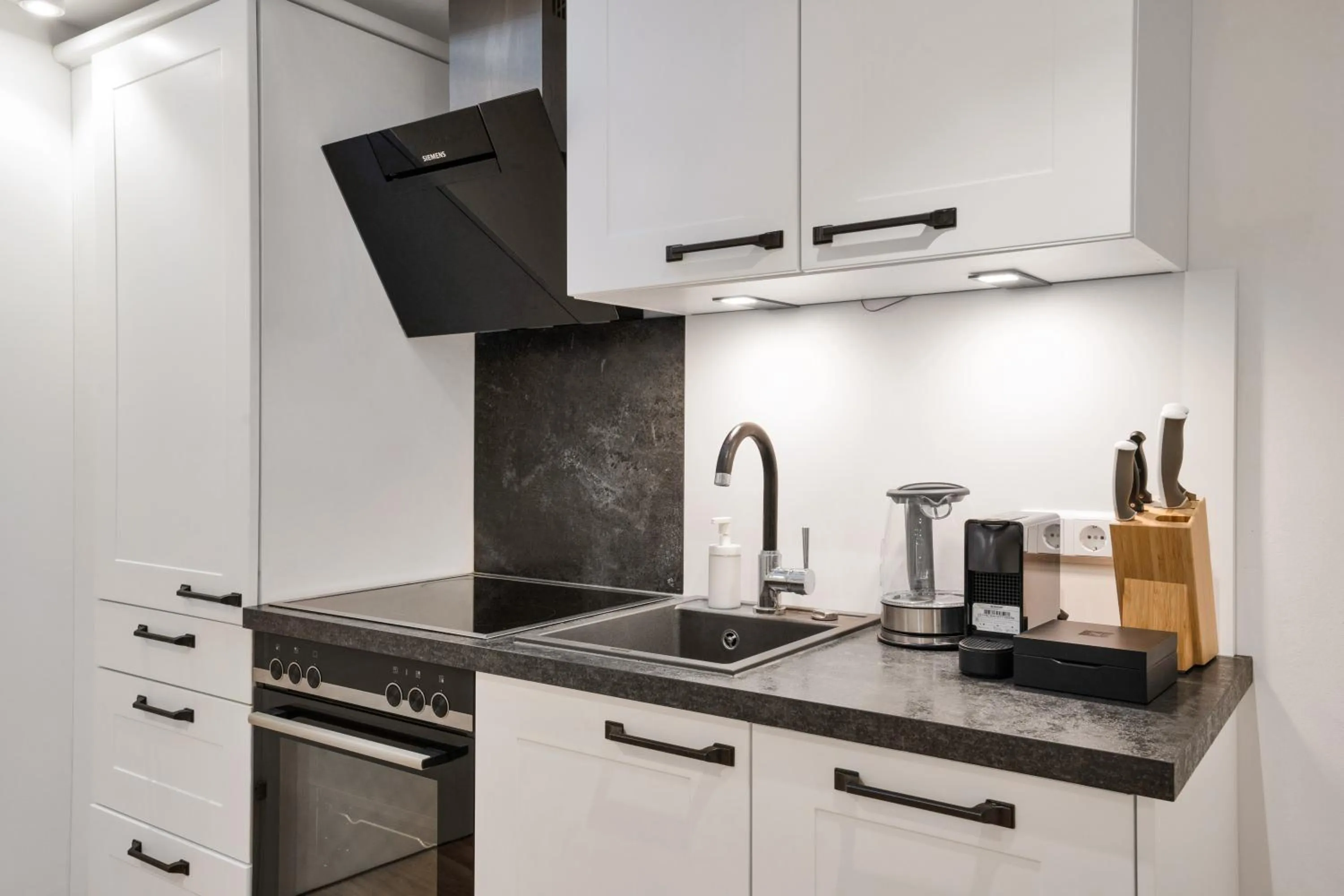 Kitchen or kitchenette in easy-flat Hauptplatz - City Center Apartments with a Kitchen