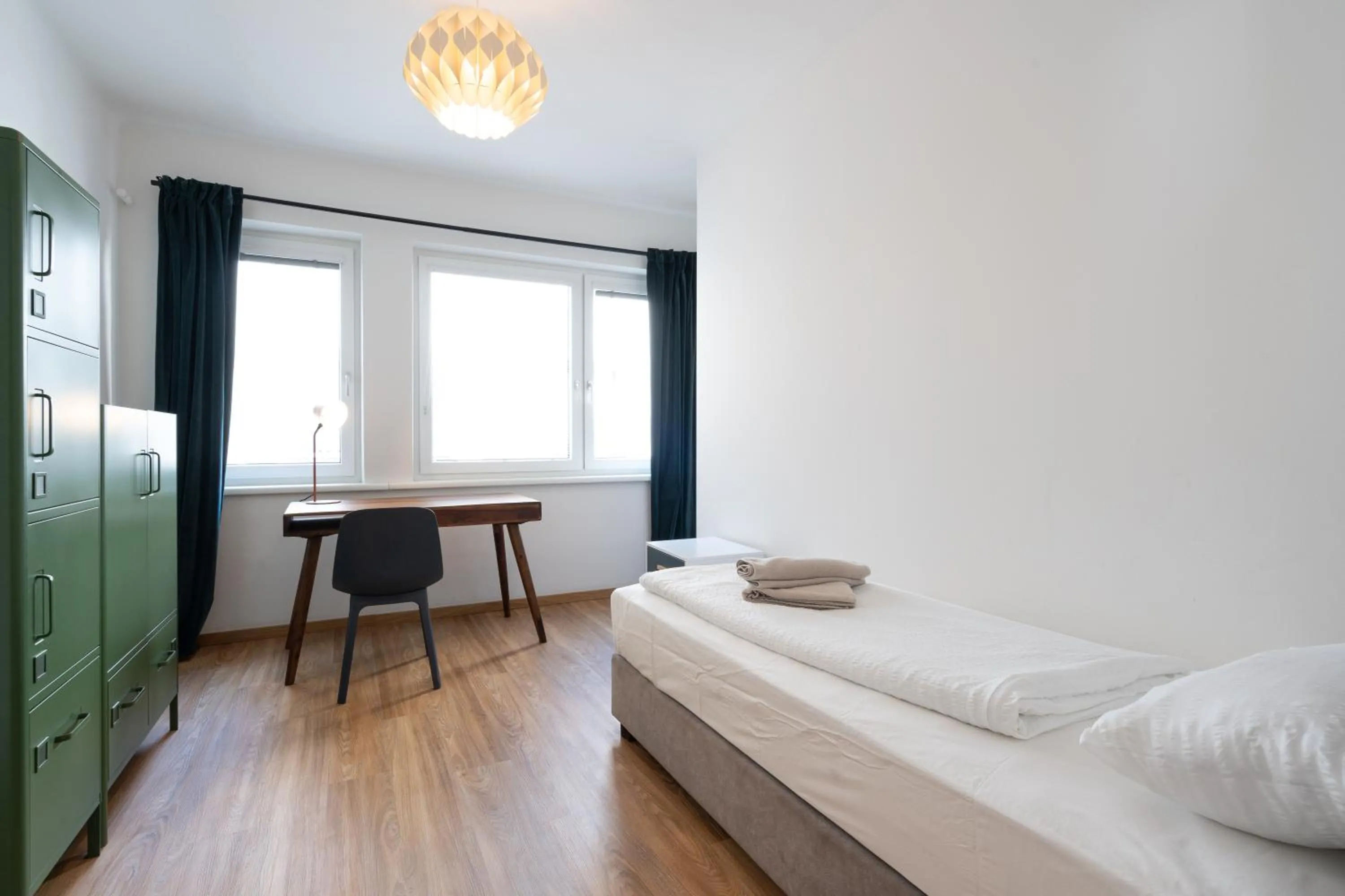 Bed in easy-flat Hauptplatz - City Center Apartments with a Kitchen