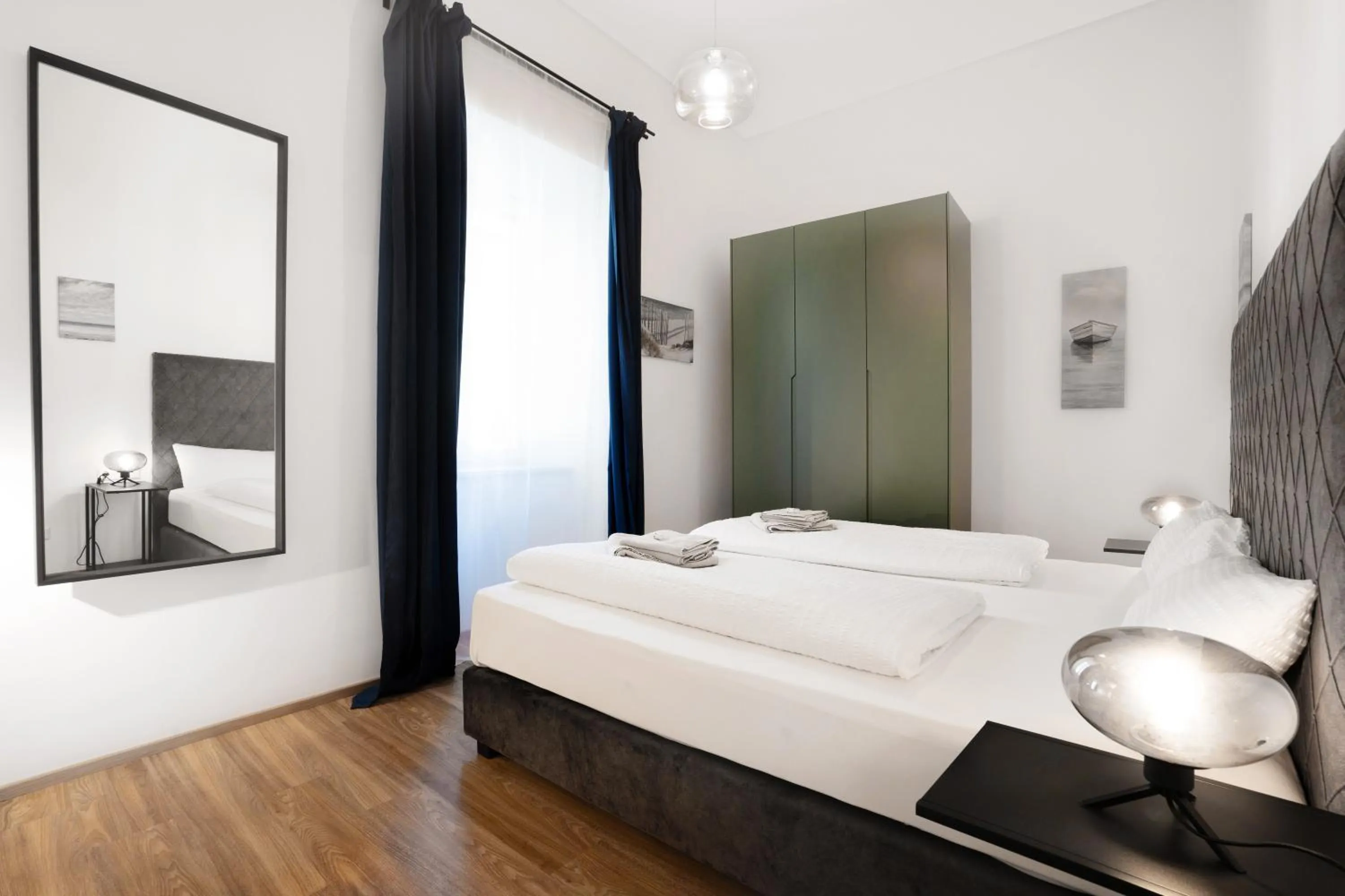 Bed in easy-flat Hauptplatz - City Center Apartments with a Kitchen