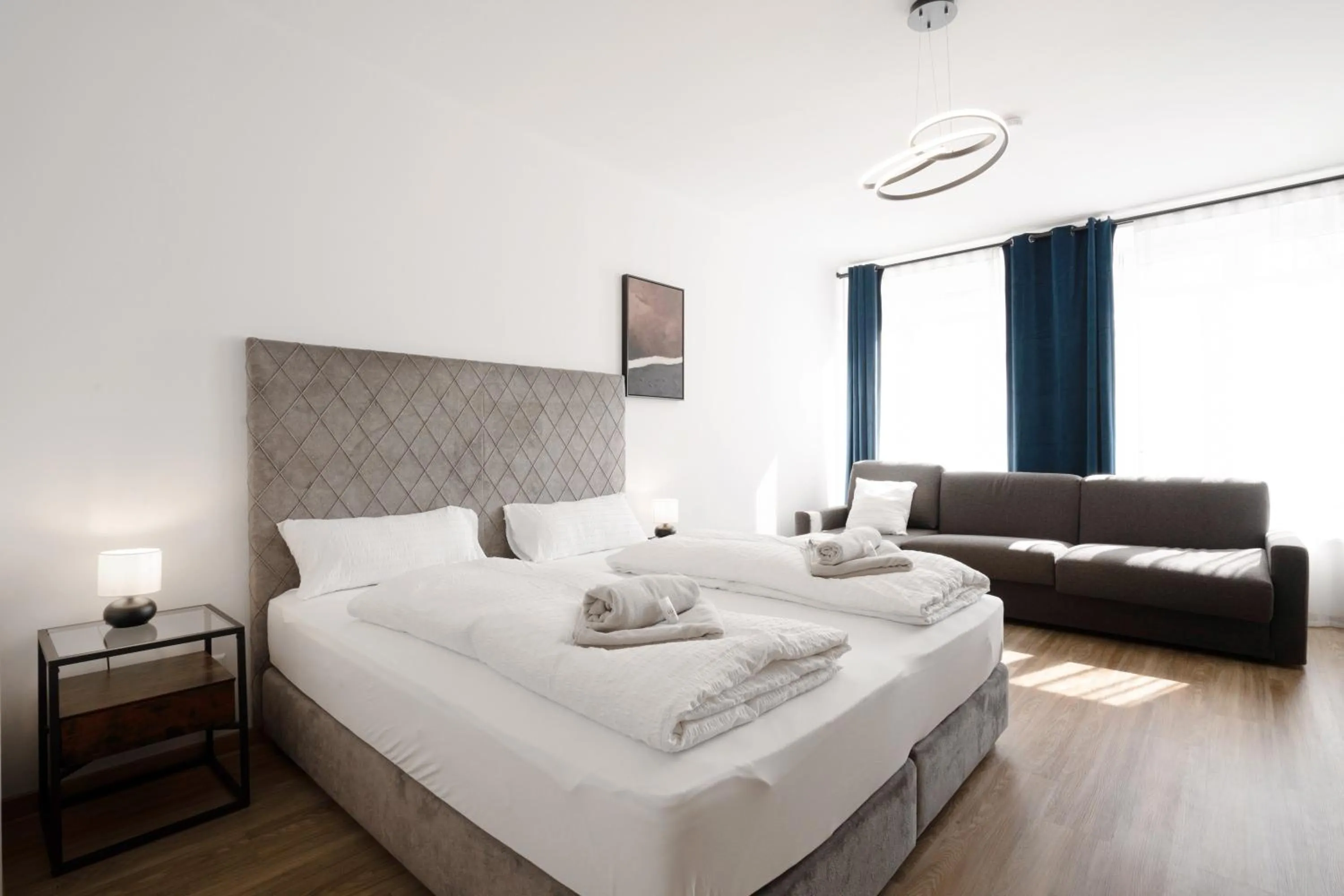 Bed in easy-flat Hauptplatz - City Center Apartments with a Kitchen
