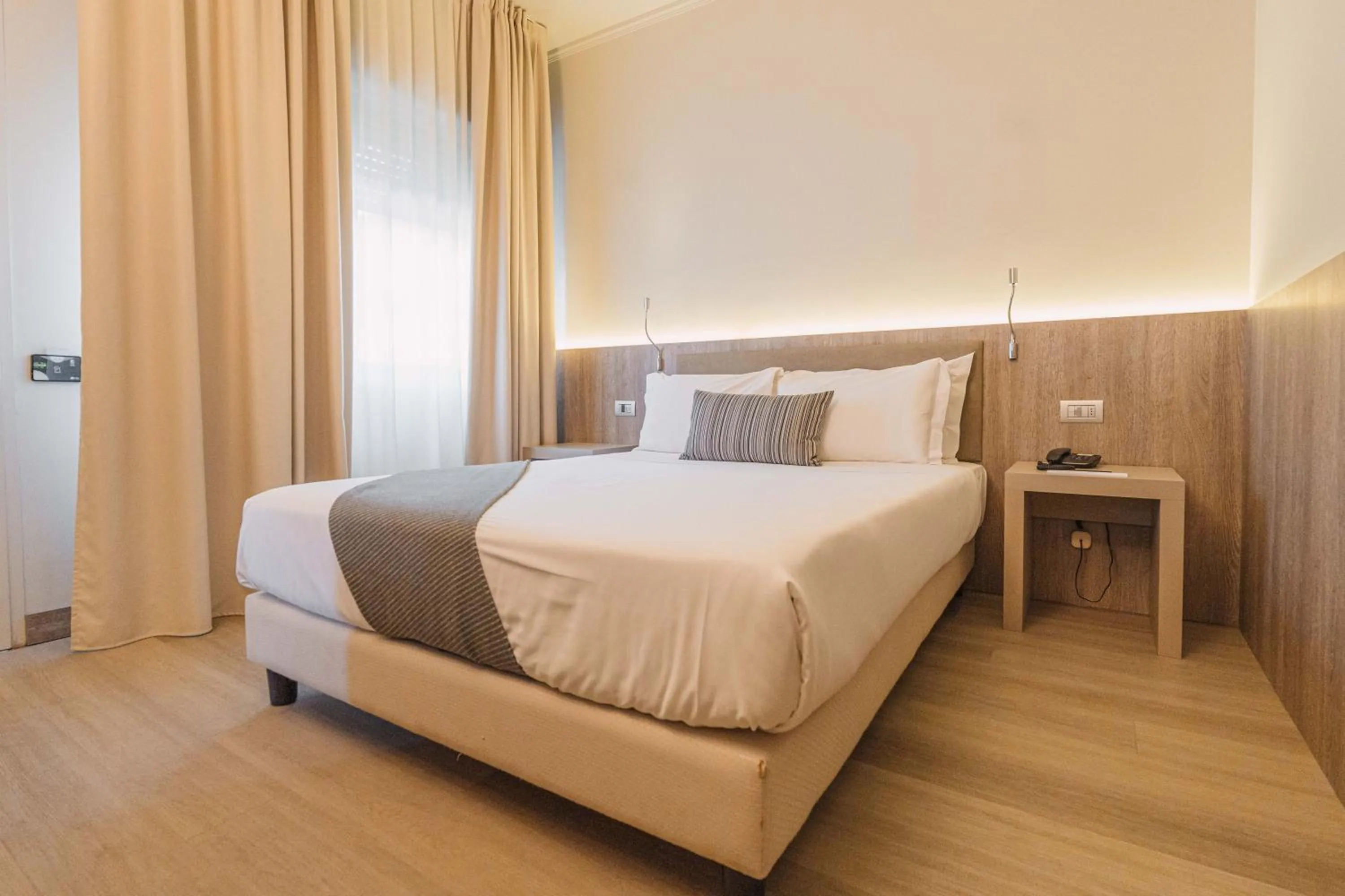 Bedroom, Bed in Living Hotel Milano