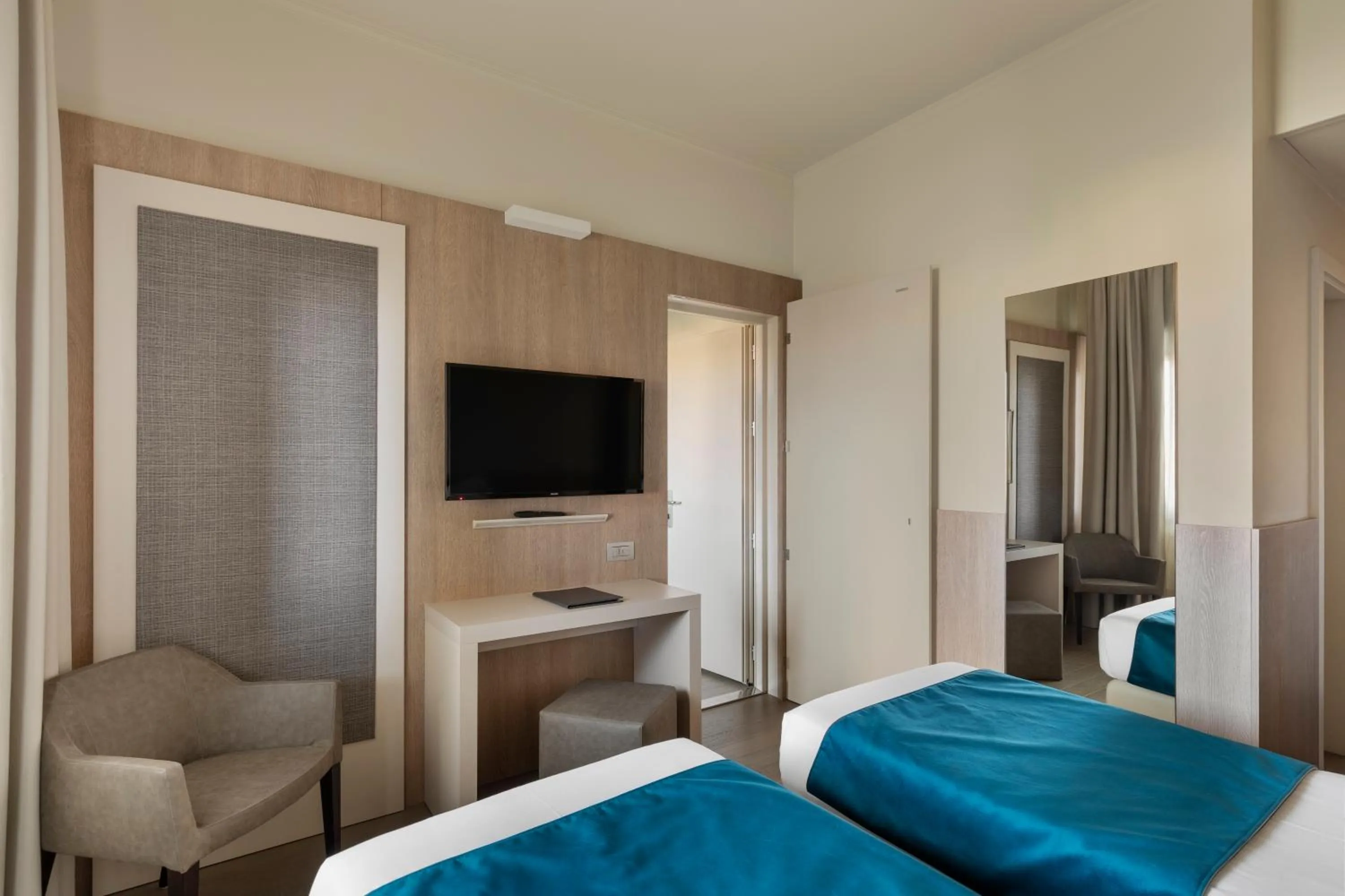 Bed in Living Hotel Milano