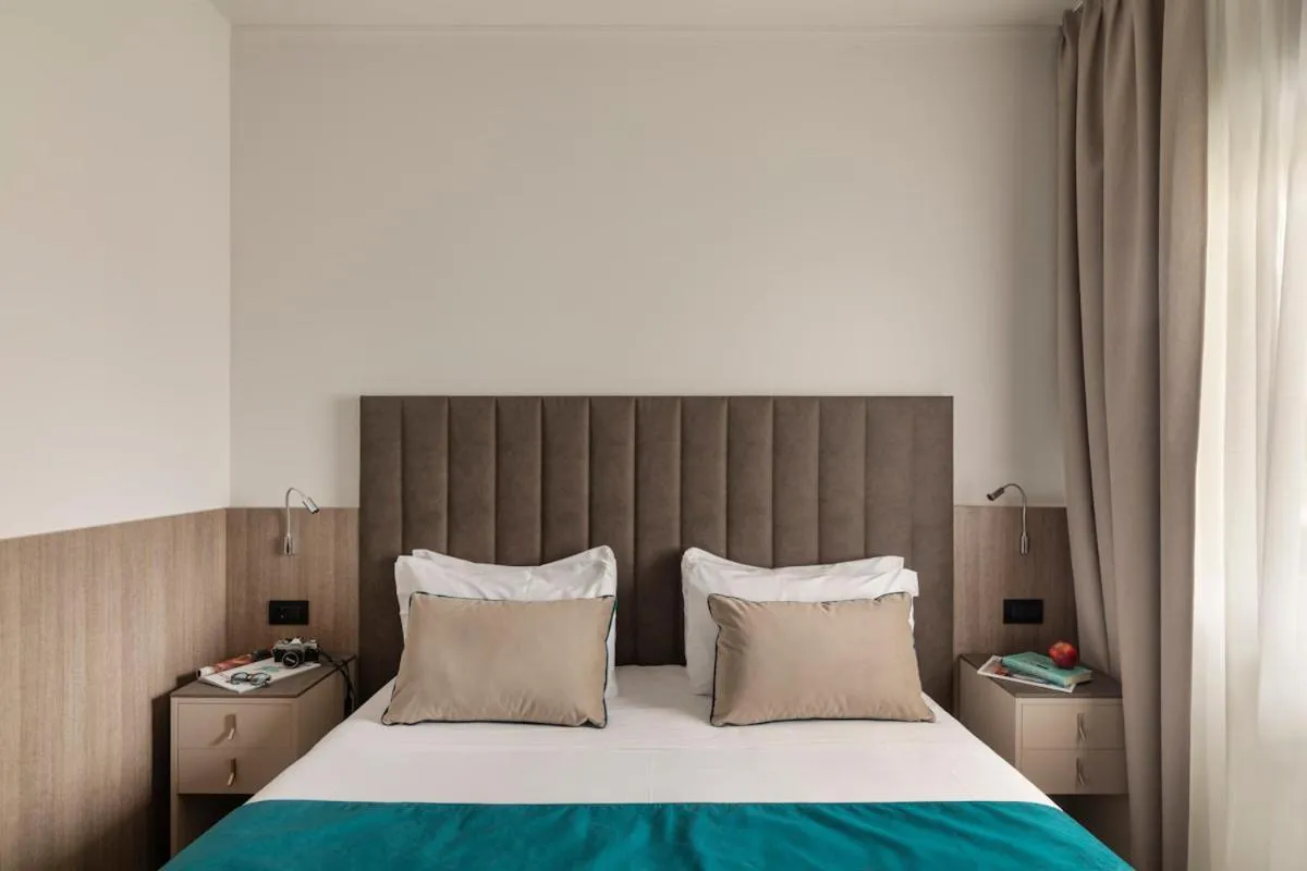 Bed in Living Hotel Milano