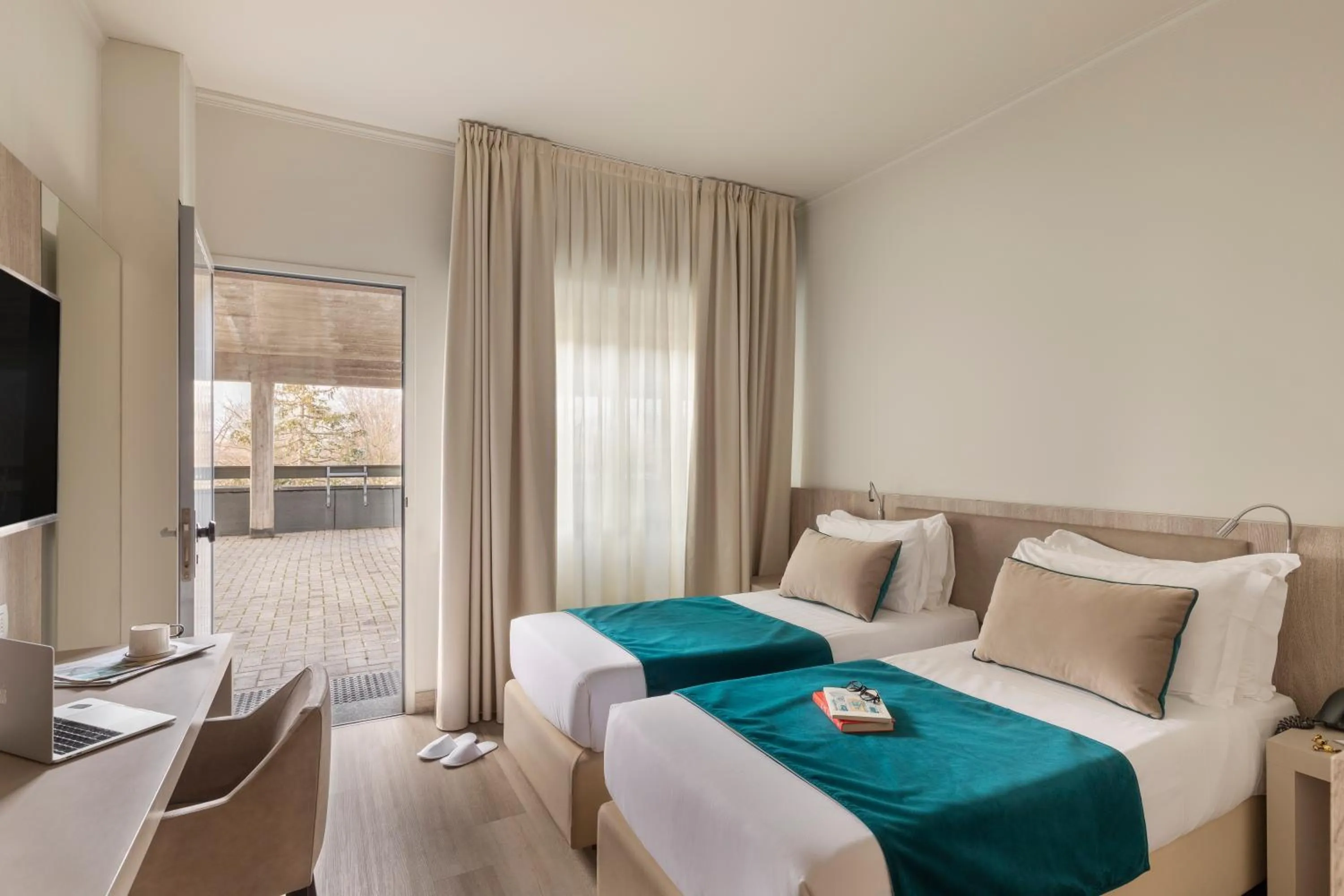 Bed in Living Hotel Milano