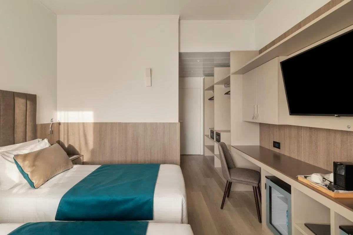 Bed in Living Hotel Milano