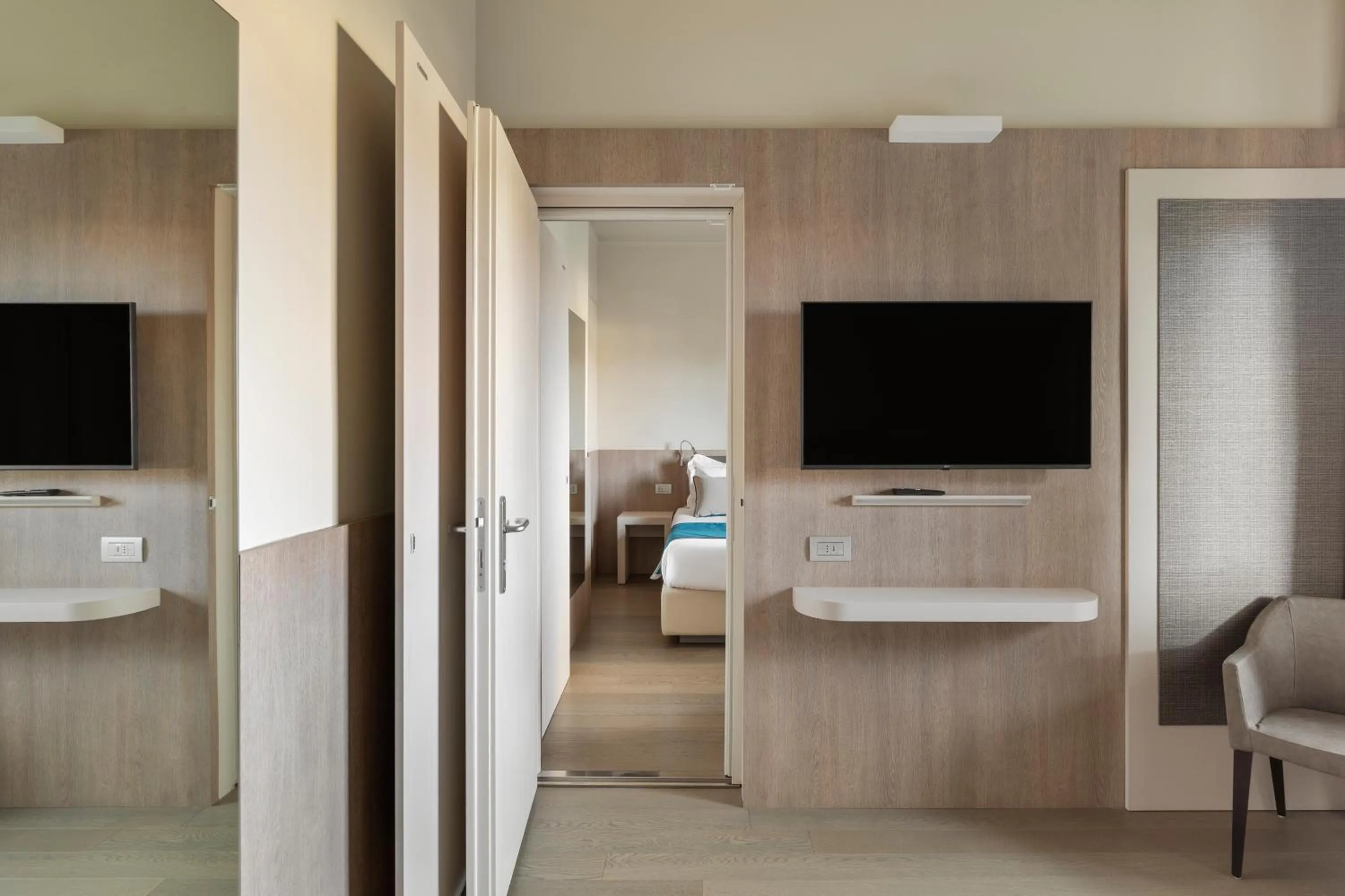 Bed in Living Hotel Milano