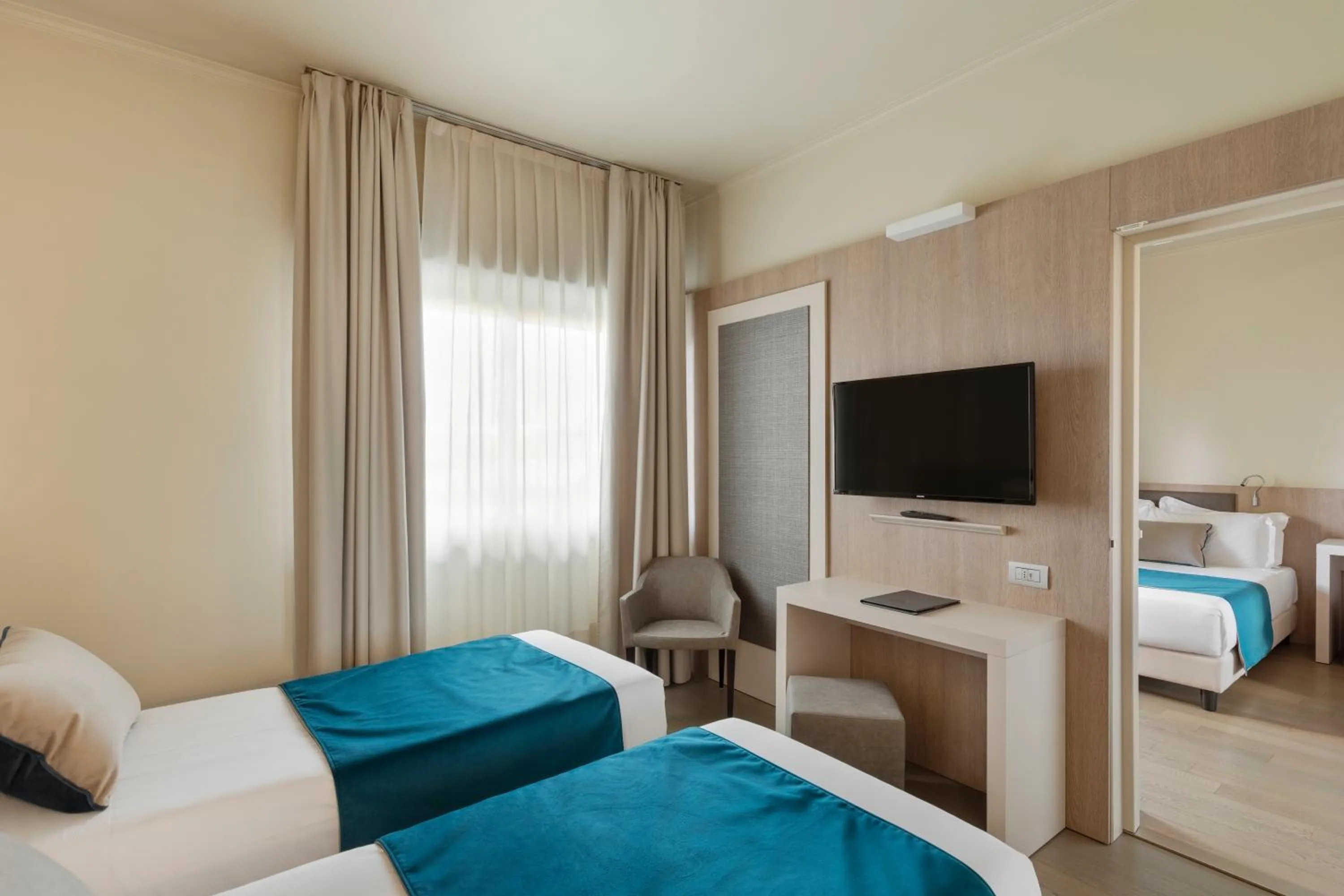 Bed in Living Hotel Milano