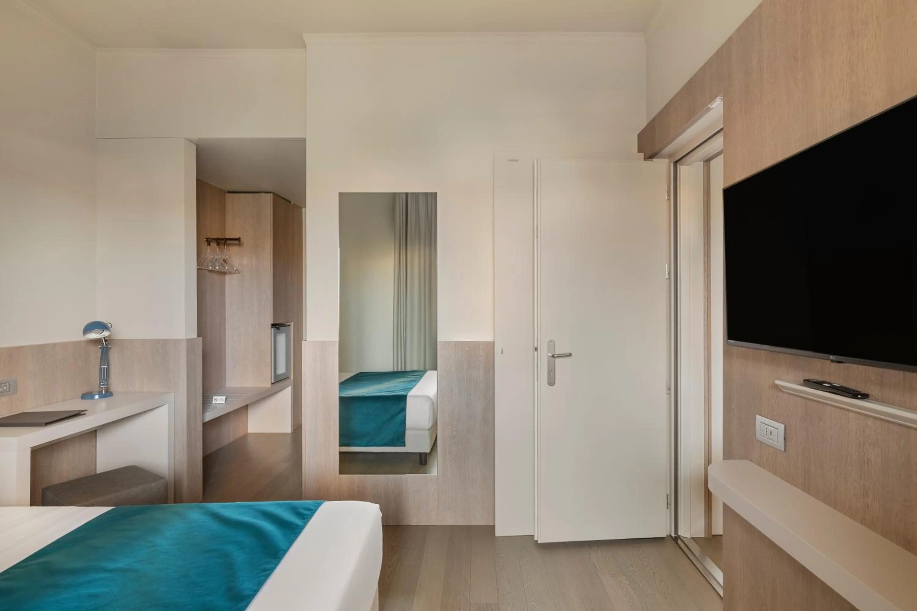 Bed in Living Hotel Milano