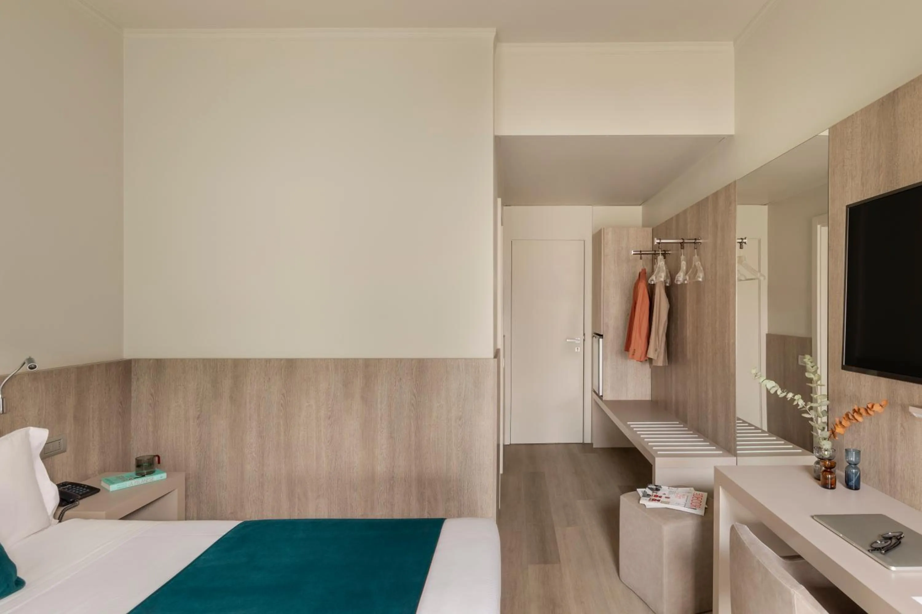 Bed in Living Hotel Milano