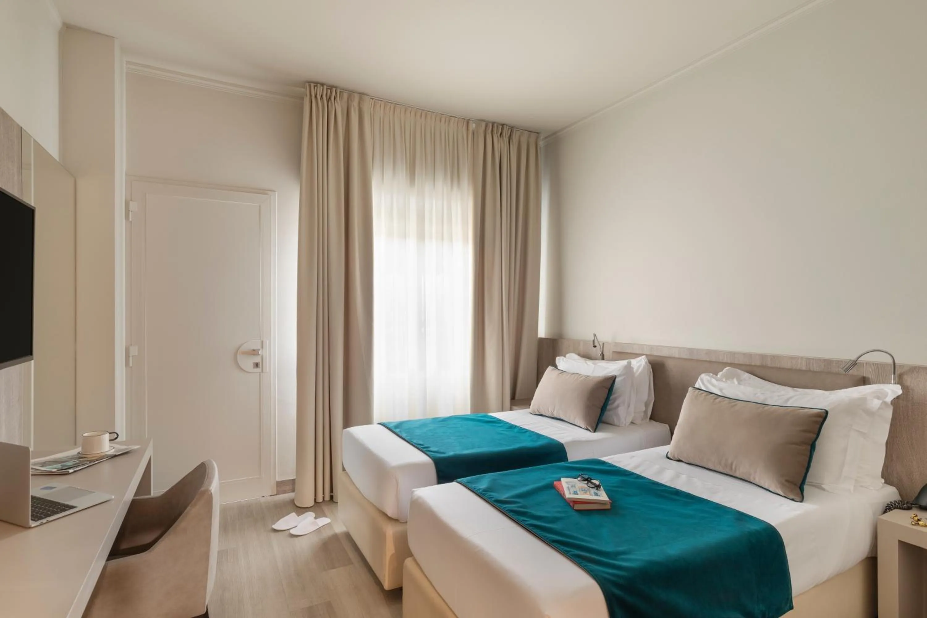 Bed in Living Hotel Milano