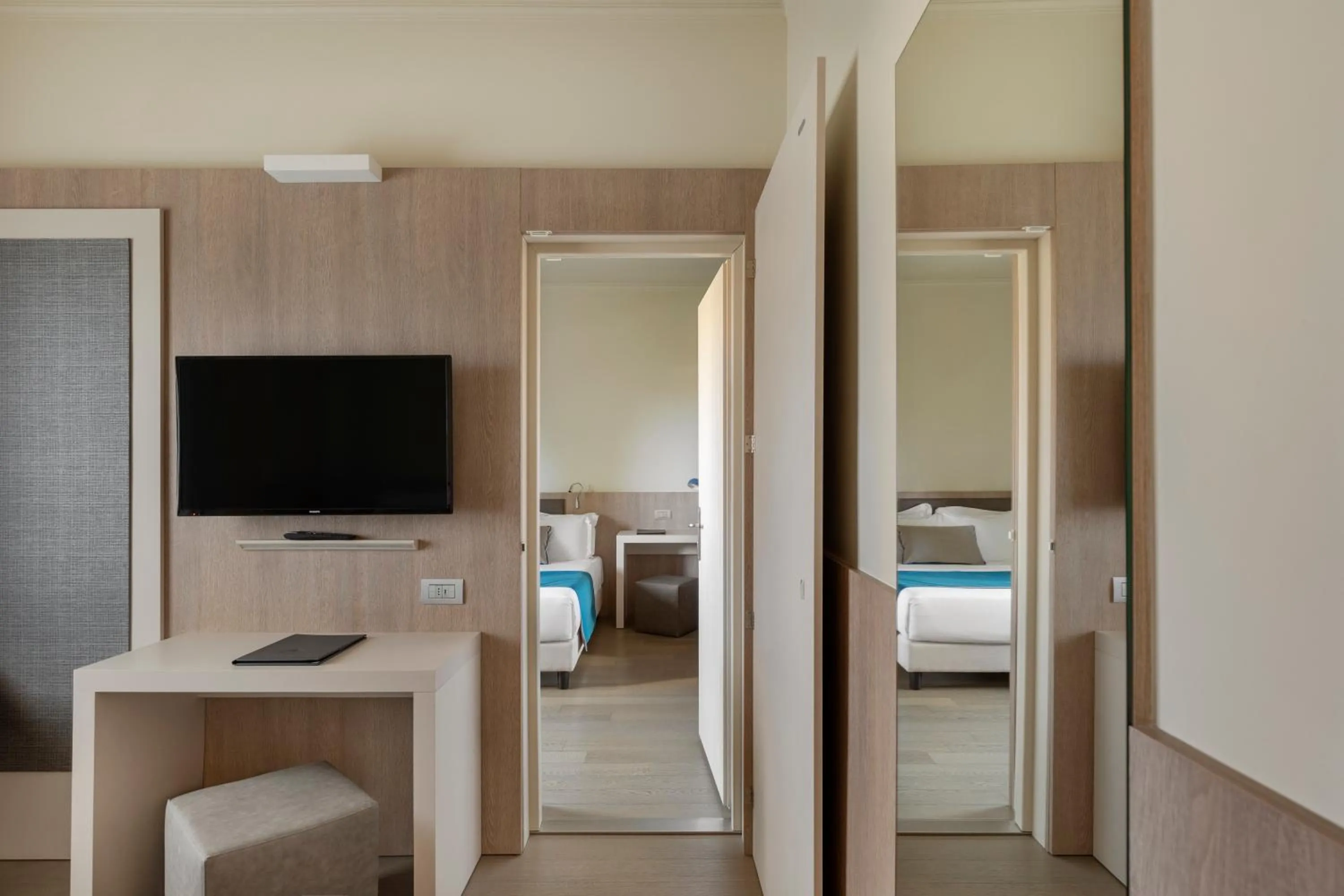 Bed in Living Hotel Milano