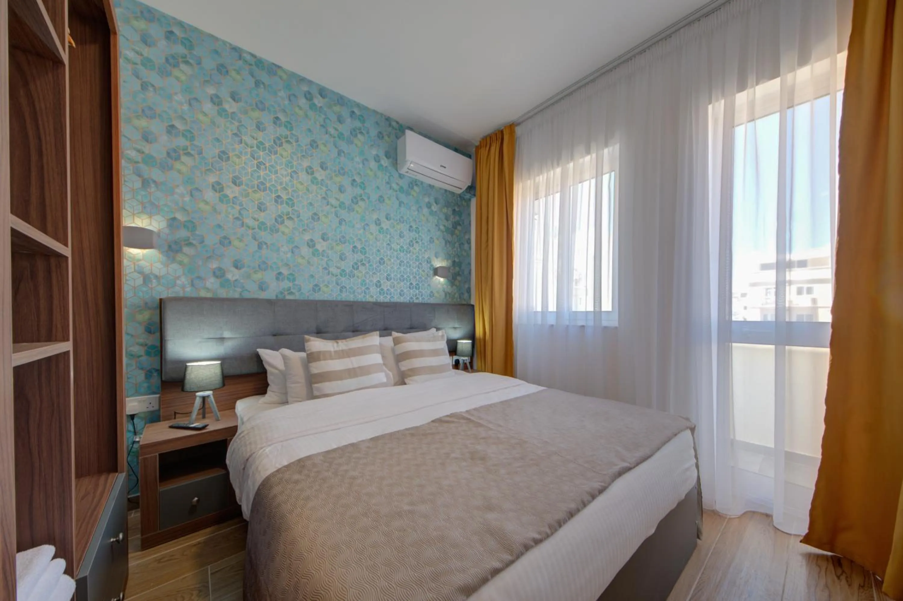 Bedroom, Bed in Marina Suites & apartments - Self catering - by Tritoni hotels