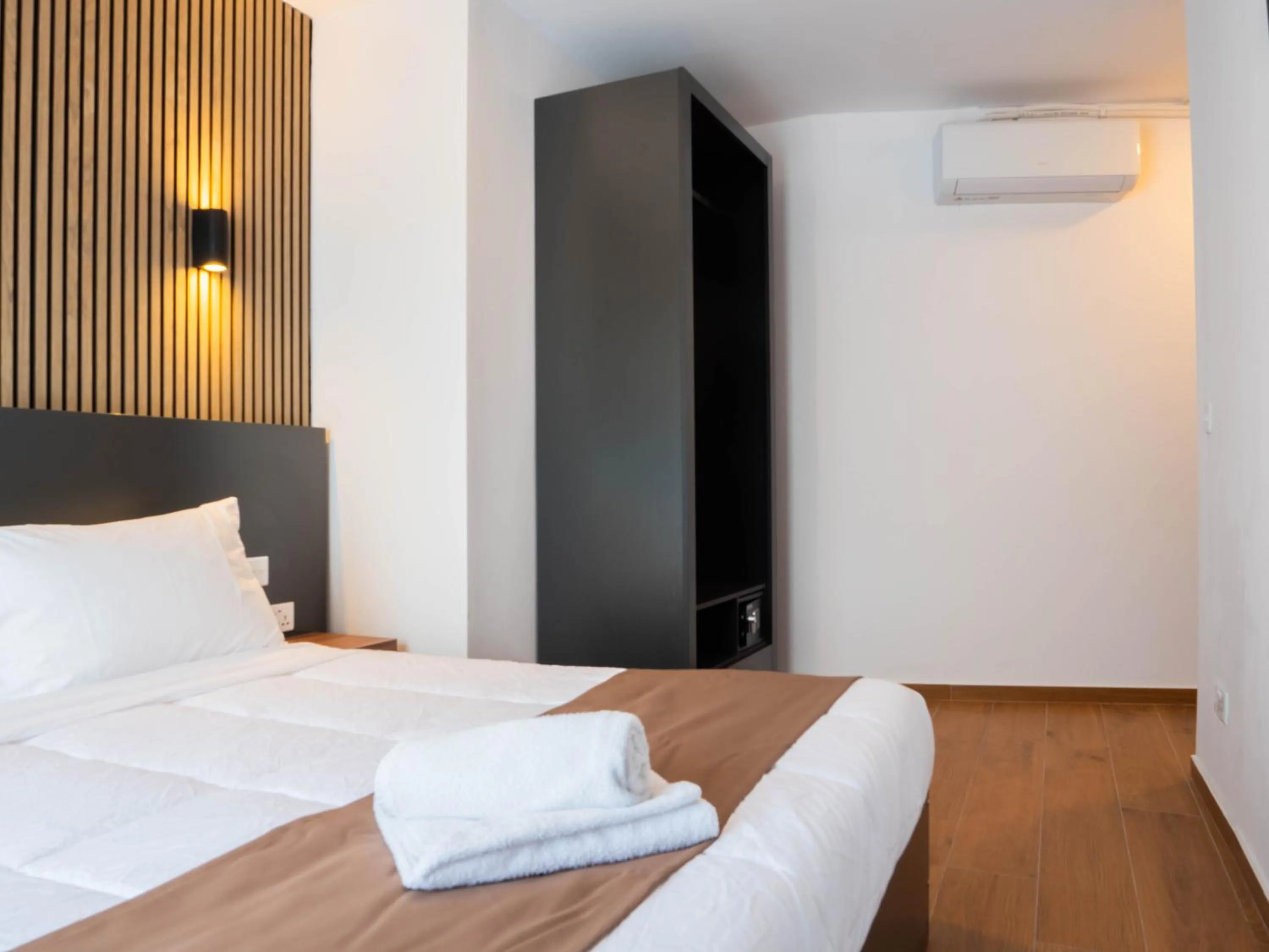 Bed in Marina Suites & apartments - Self catering - by Tritoni hotels