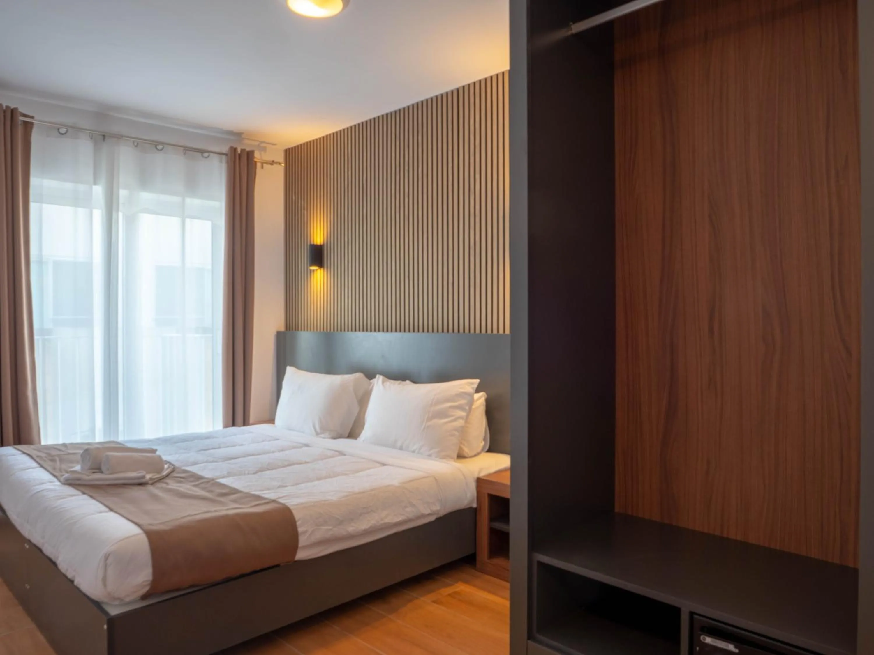 Bed in Marina Suites & apartments - Self catering - by Tritoni hotels