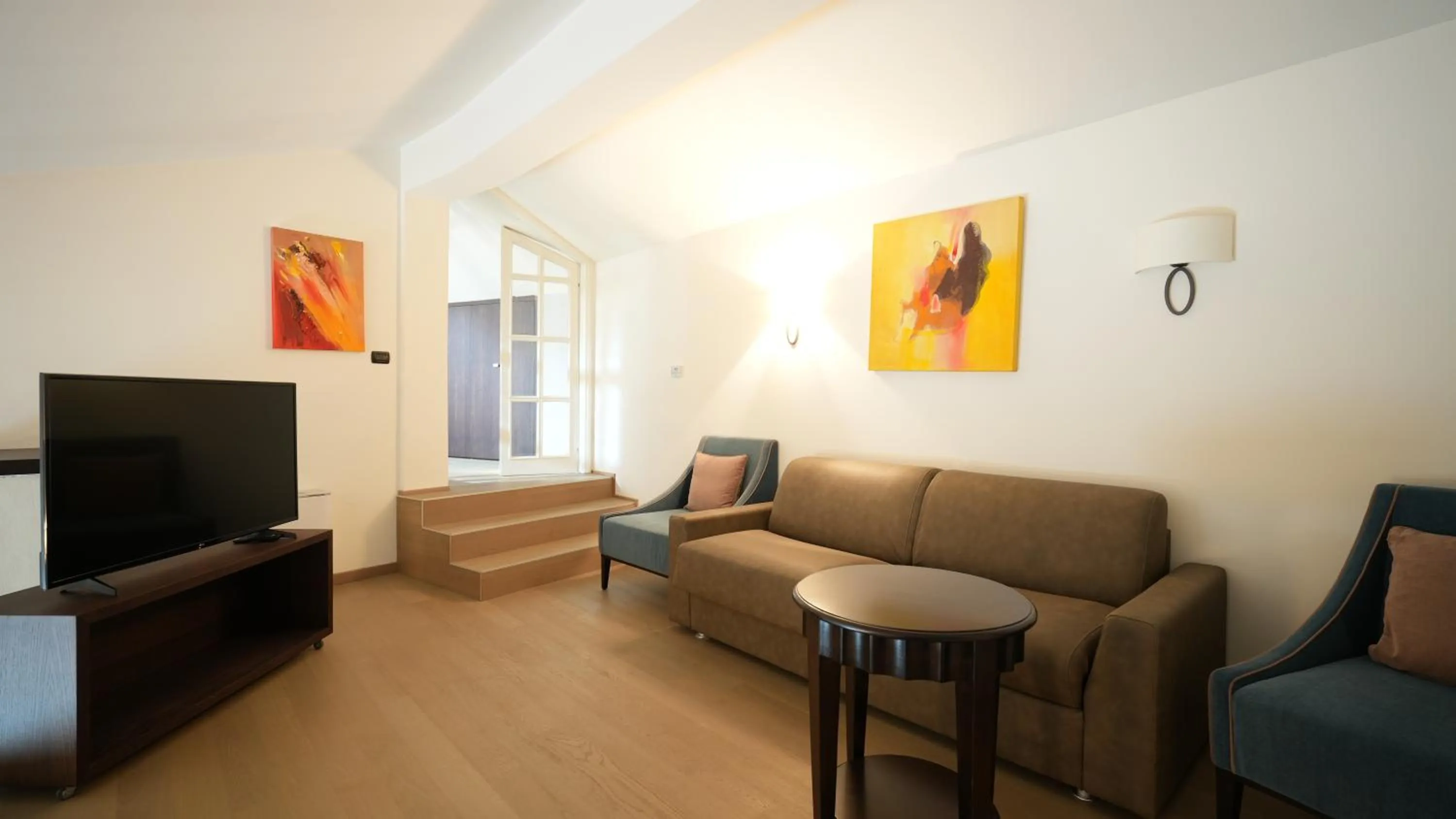 Communal lounge/ TV room in Hotel Europa