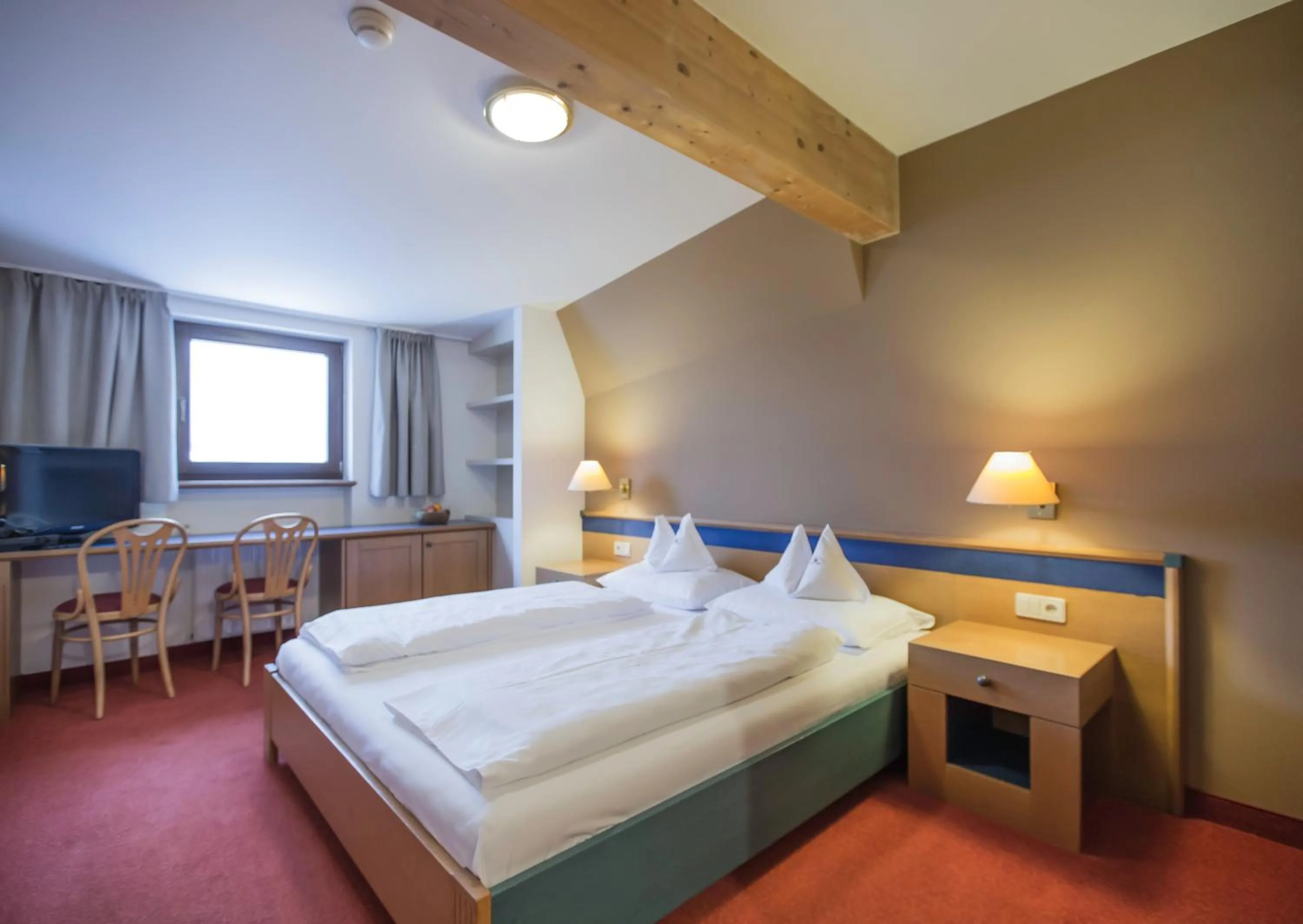 Bedroom, Bed in Alphotel Stocker Alpine Wellnesshotel