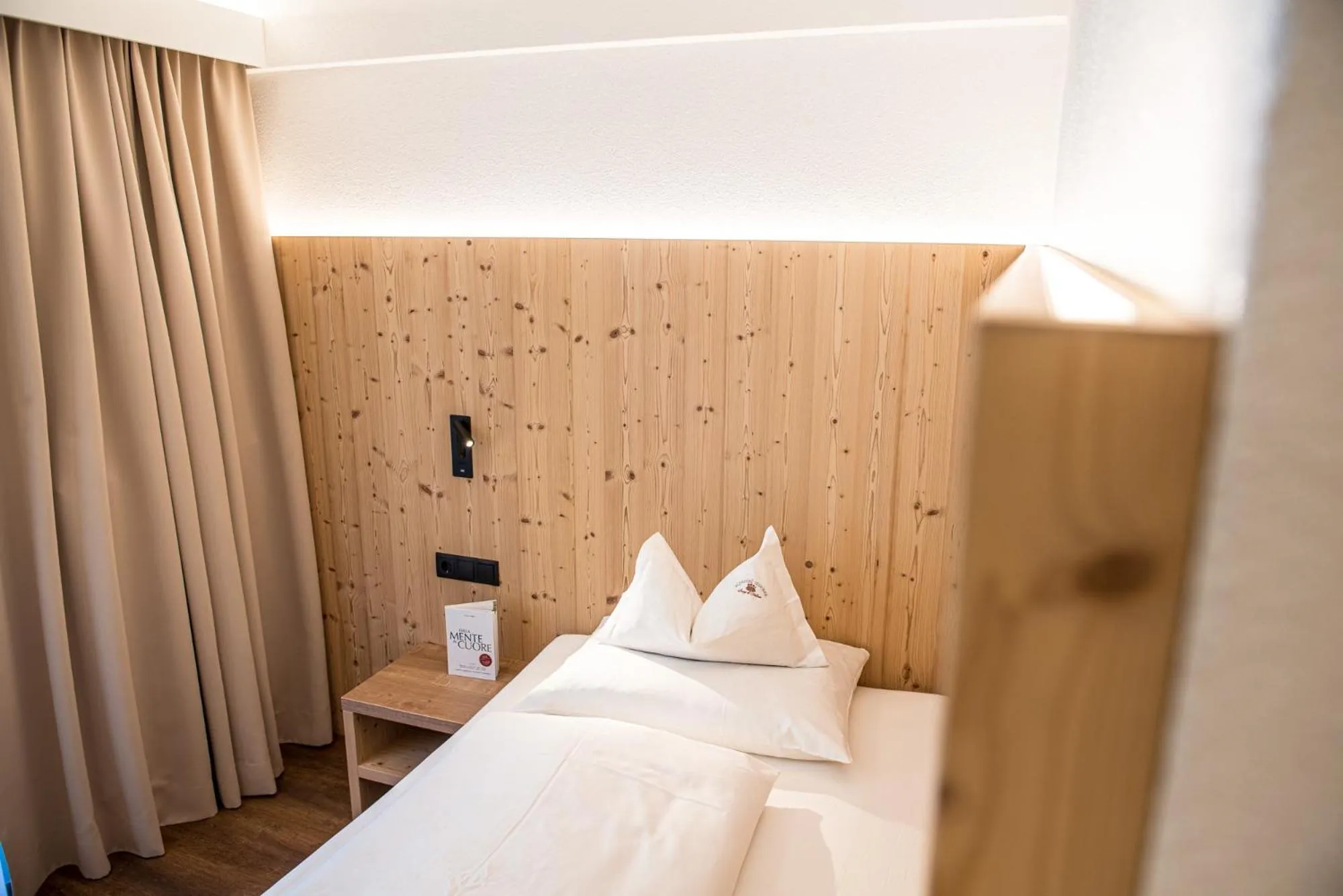 Bedroom, Bed in Alphotel Stocker Alpine Wellnesshotel