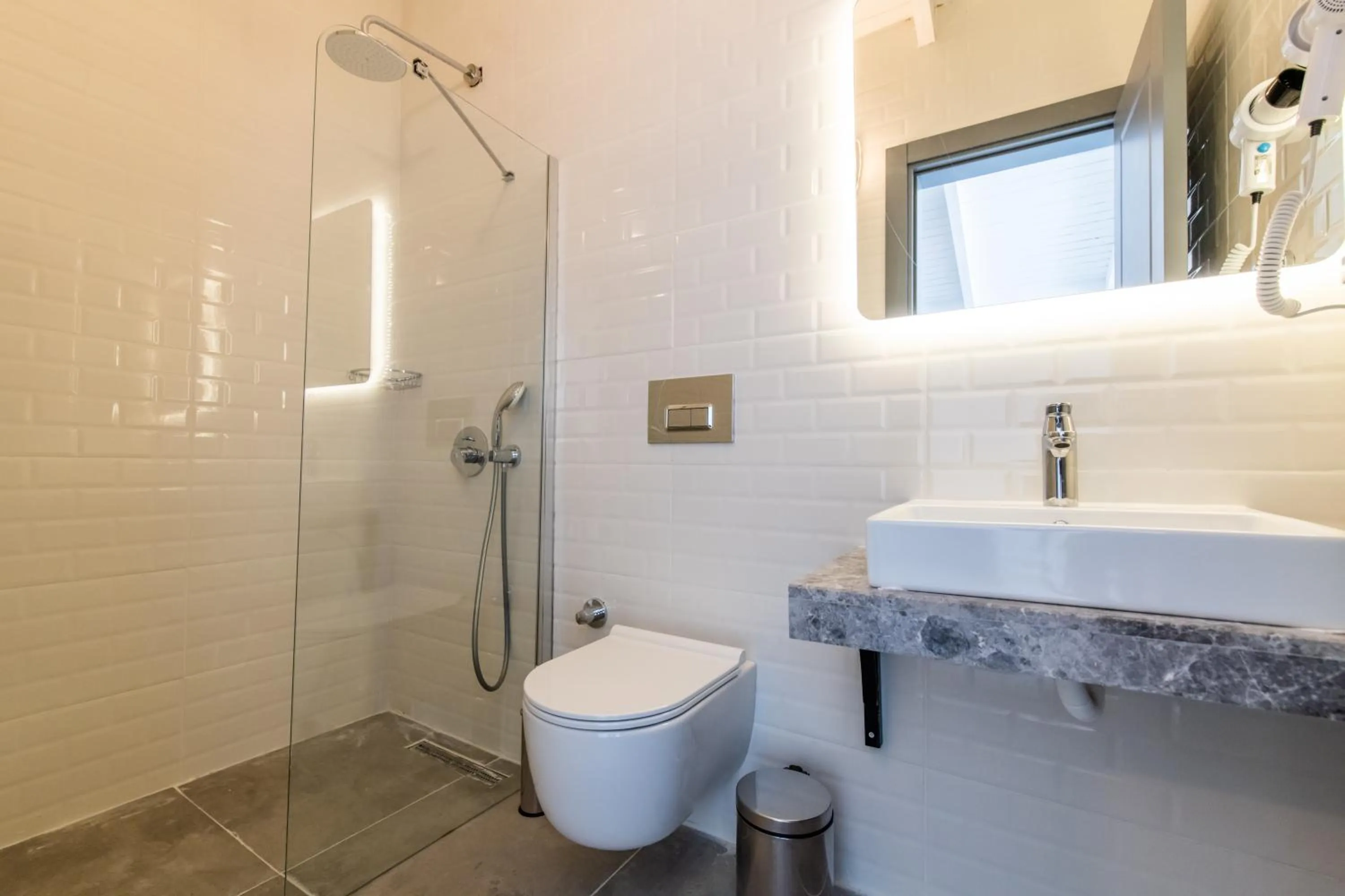 Bathroom in Leonis Hotel